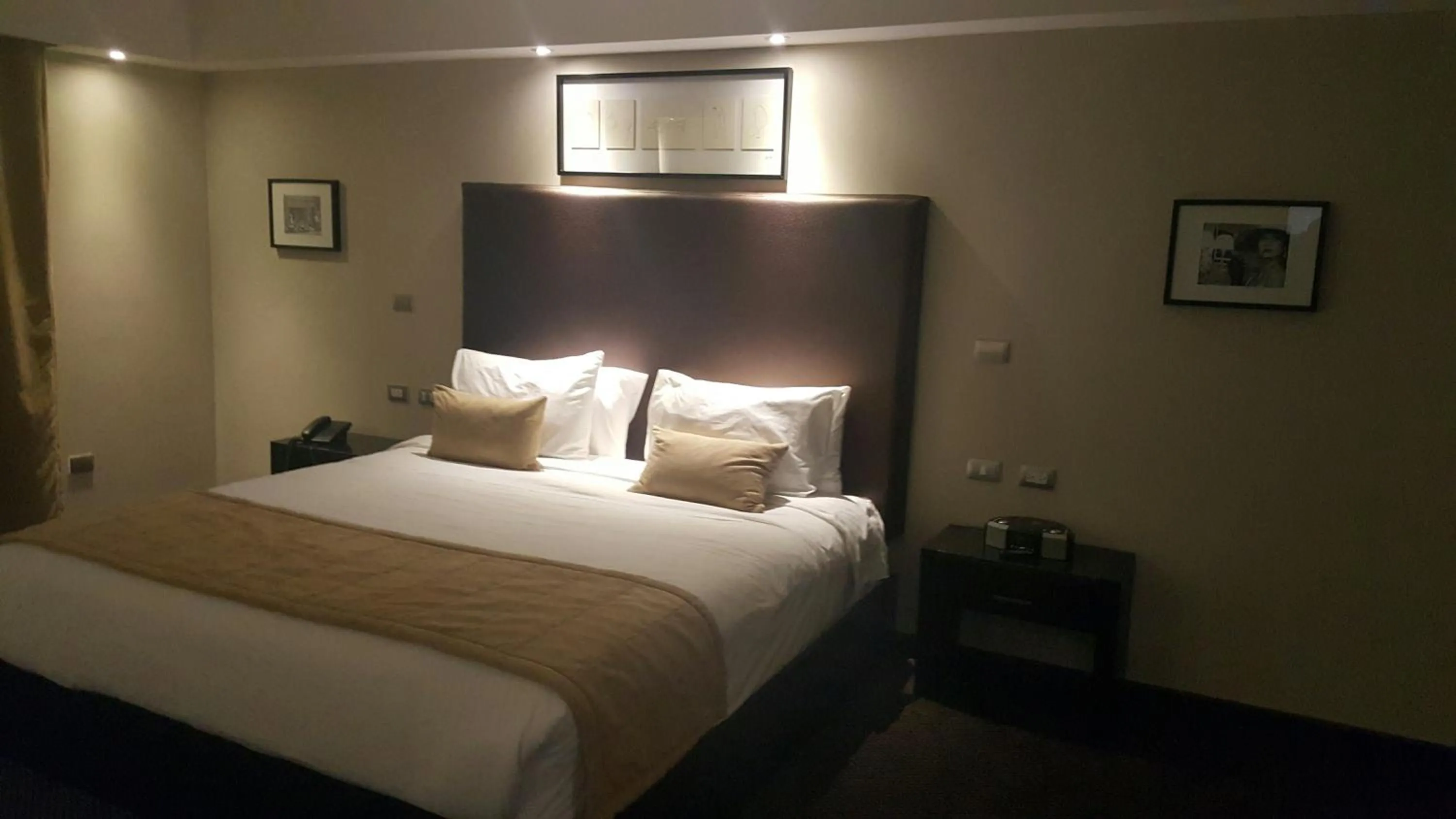 Bed in Savoy Hotel Boutique