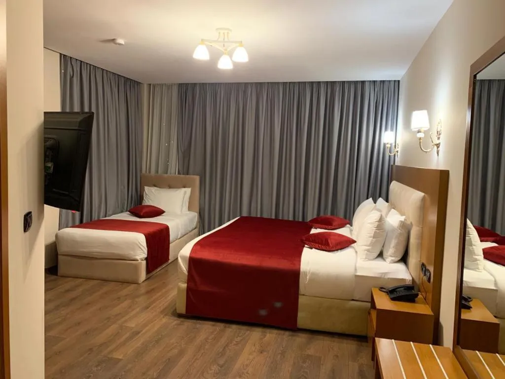 Bed in Albanopolis Hotel