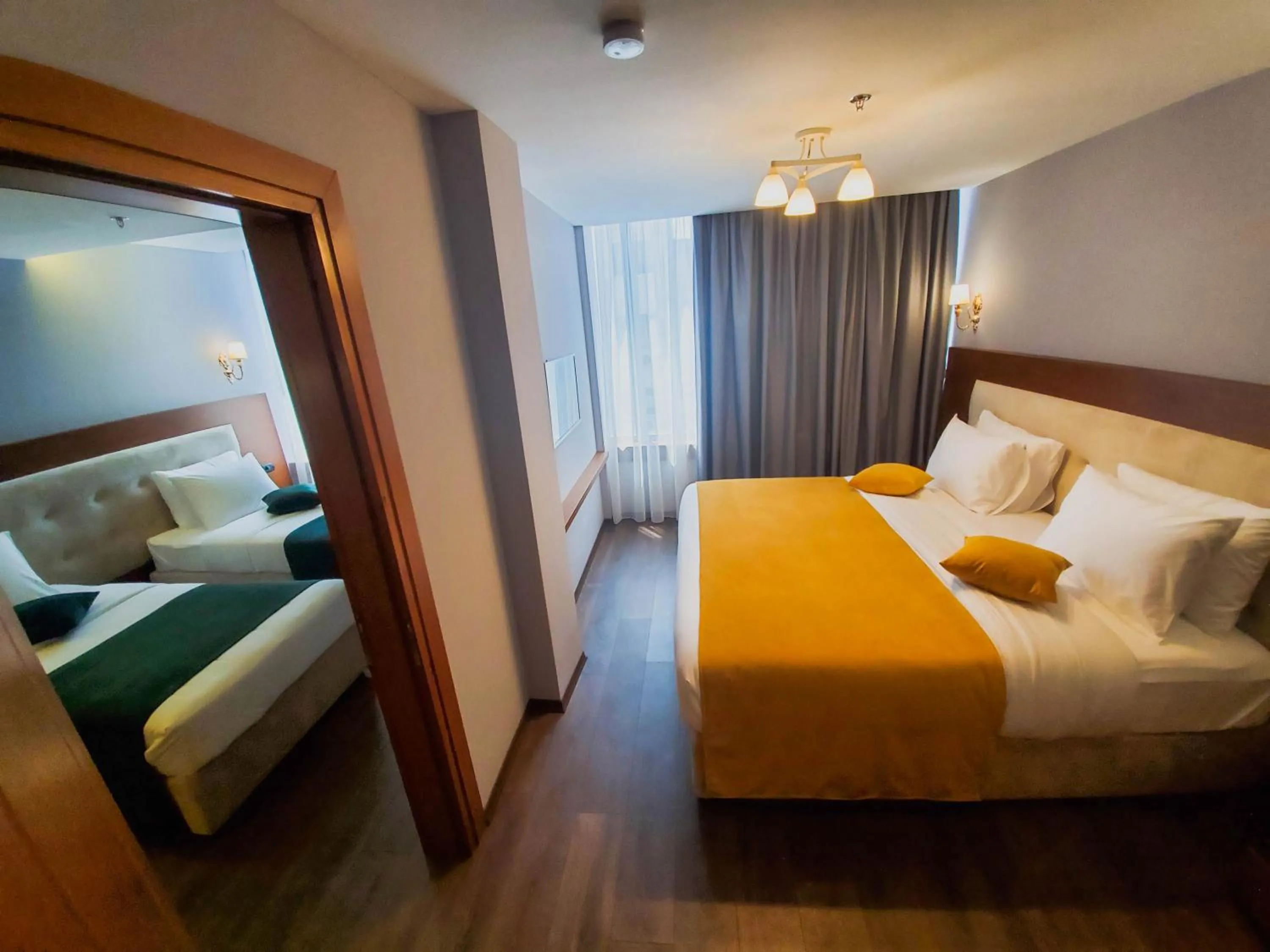 Bed in Albanopolis Hotel