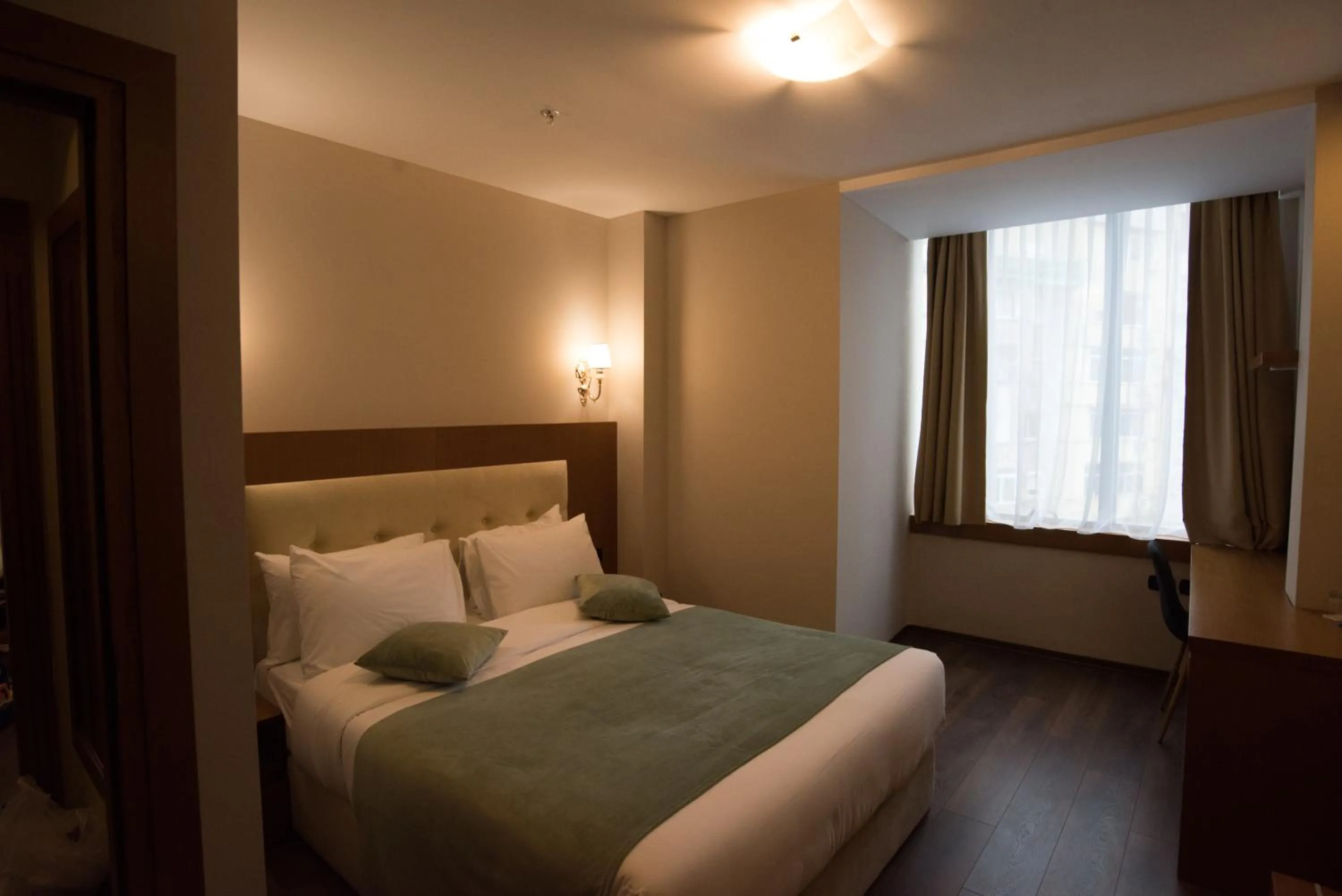 Bed in Albanopolis Hotel