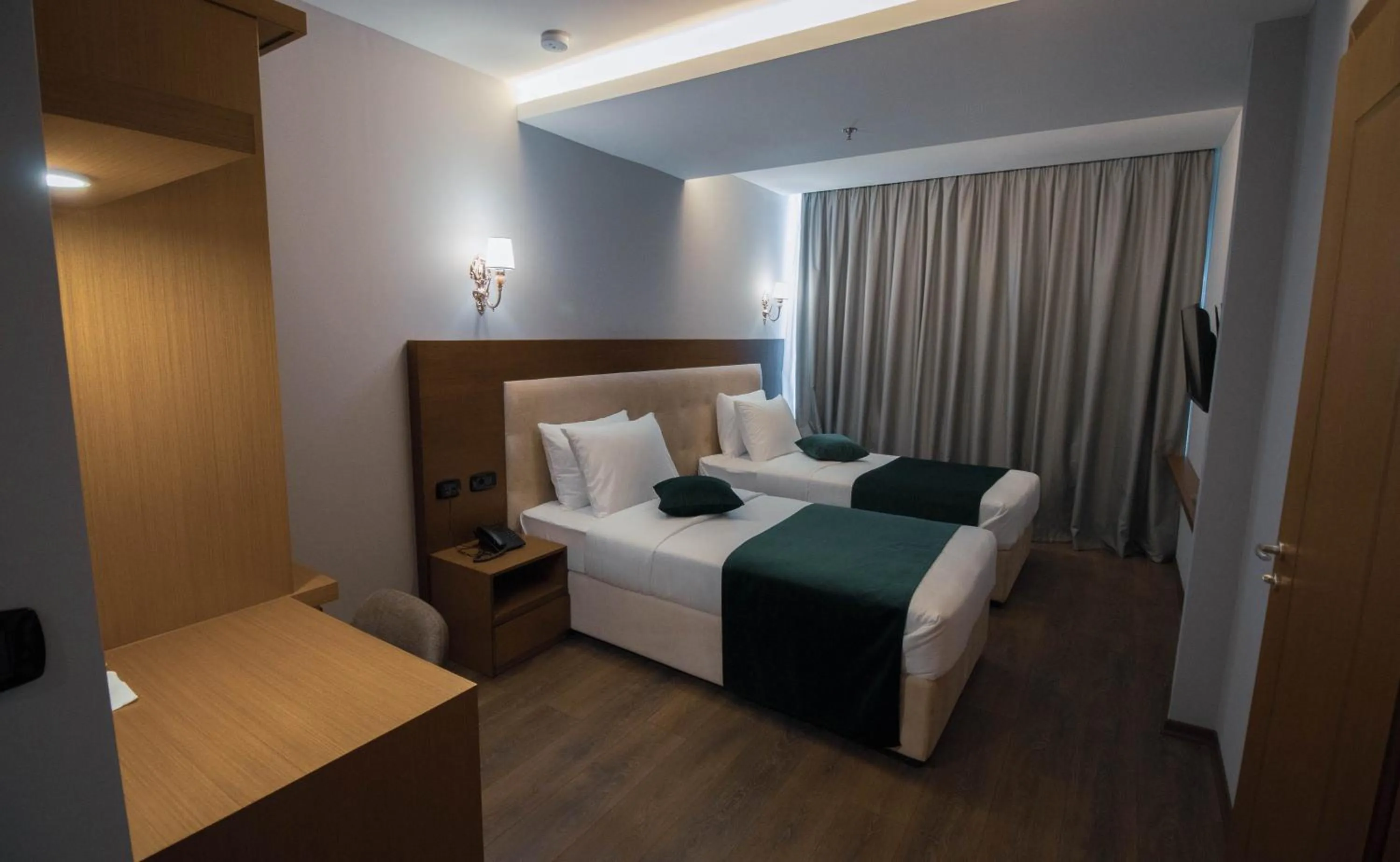 Bed in Albanopolis Hotel