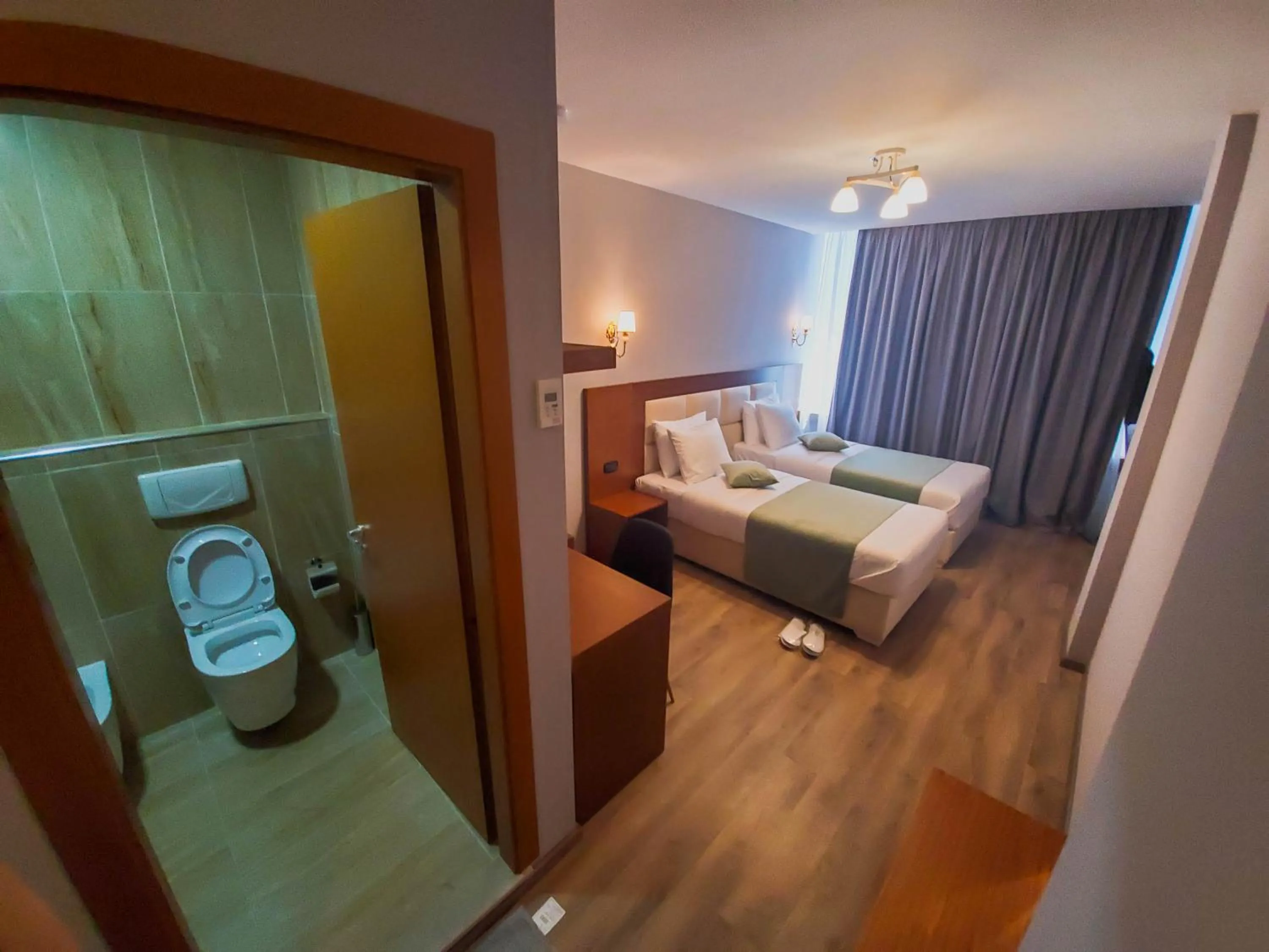 Bed in Albanopolis Hotel