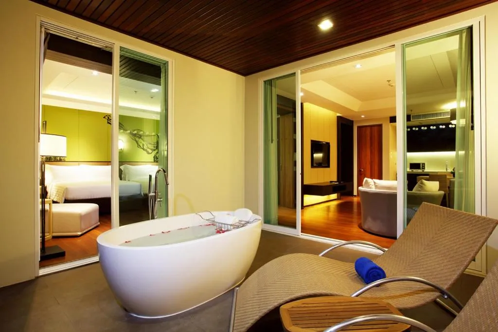 Bed in Graceland Khaolak Beachfront Resort