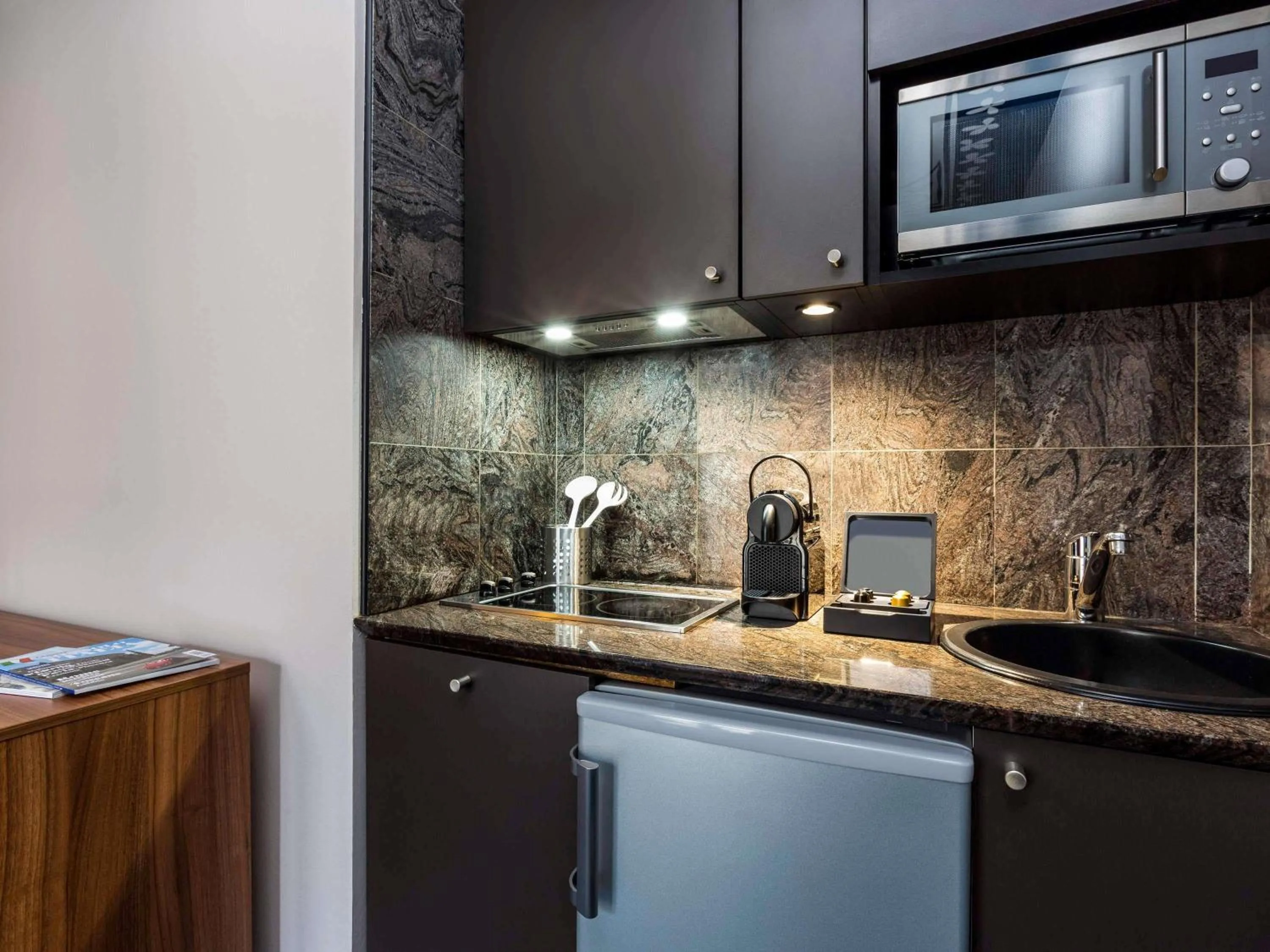 Bedroom in Aparthotel Adagio Paris Haussmann Champs Elysées