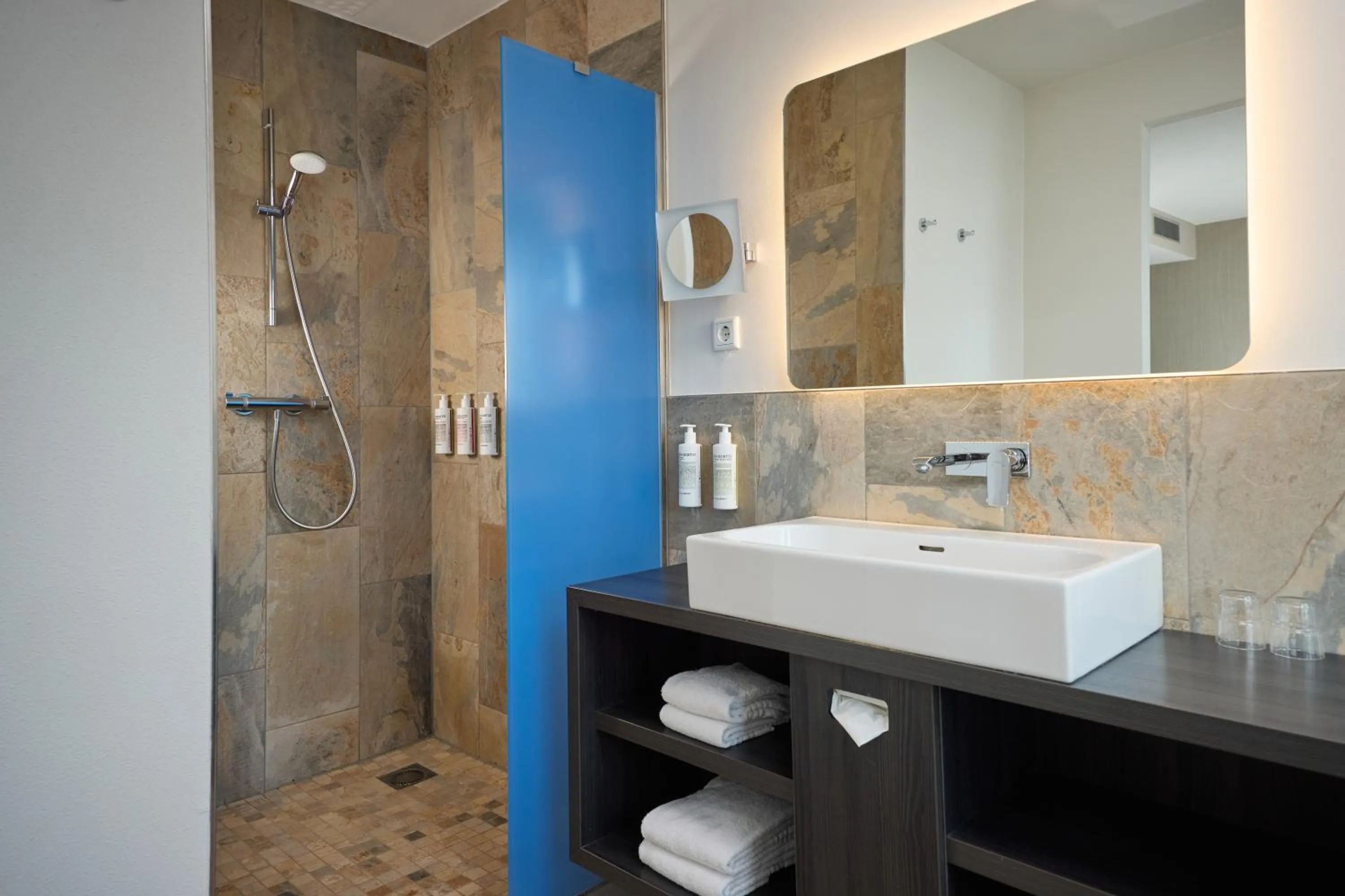 Bathroom in Haven Hotel Rotterdam, Curio Collection by Hilton