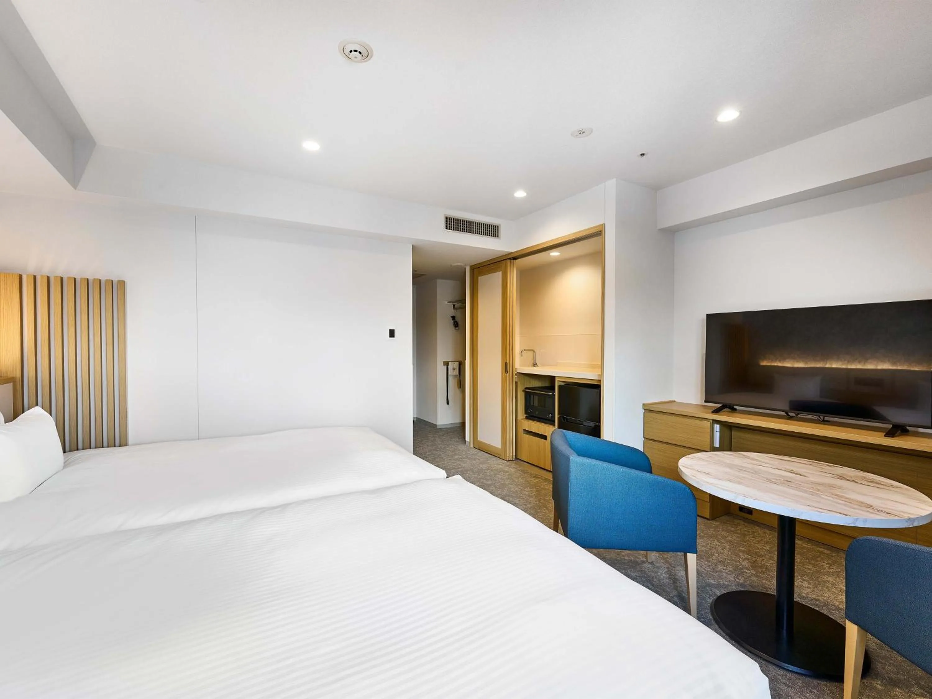 Bed in Daiwa Roynet Hotel Naha Kokusaidori