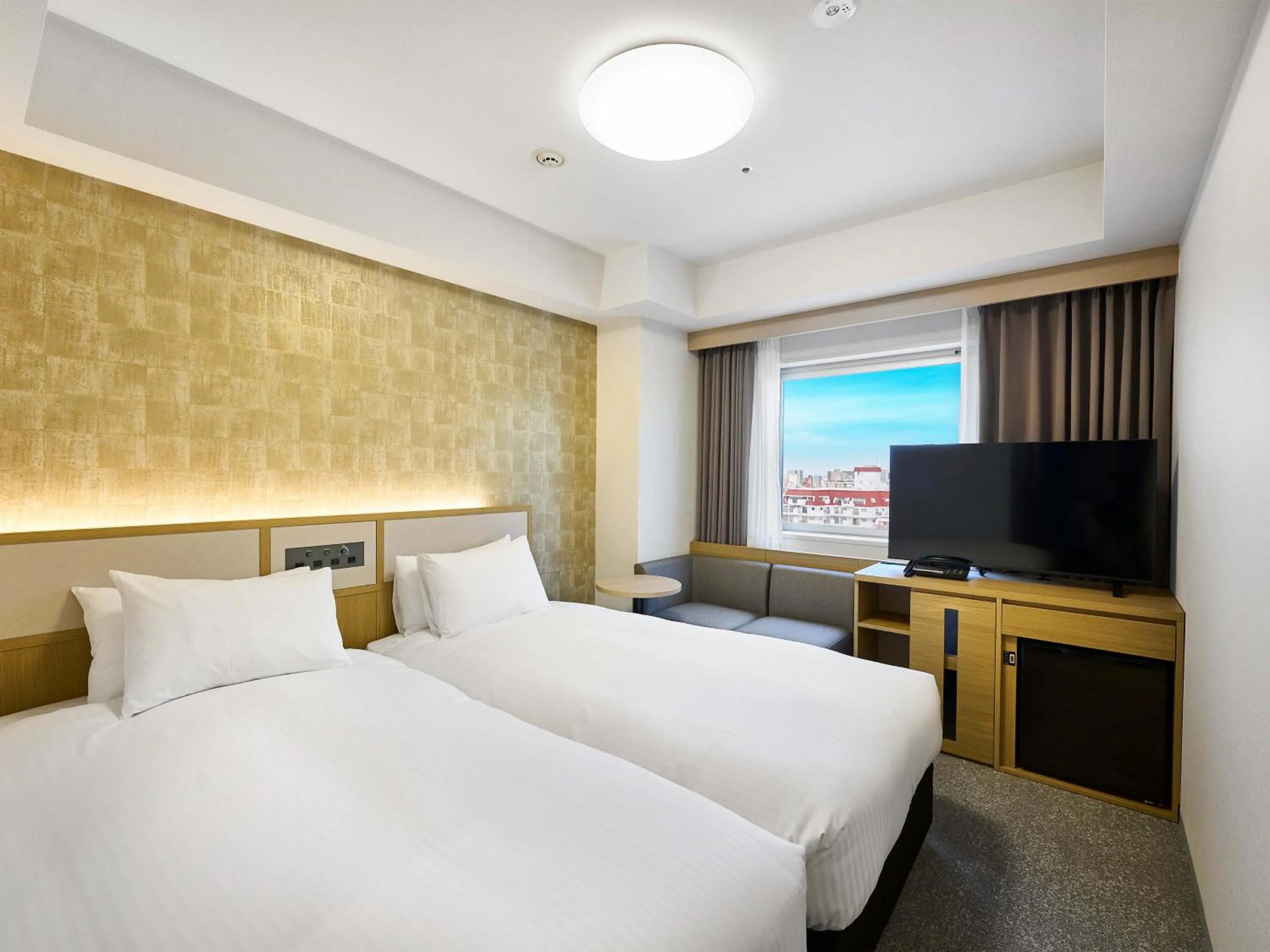 Bed in Daiwa Roynet Hotel Naha Kokusaidori