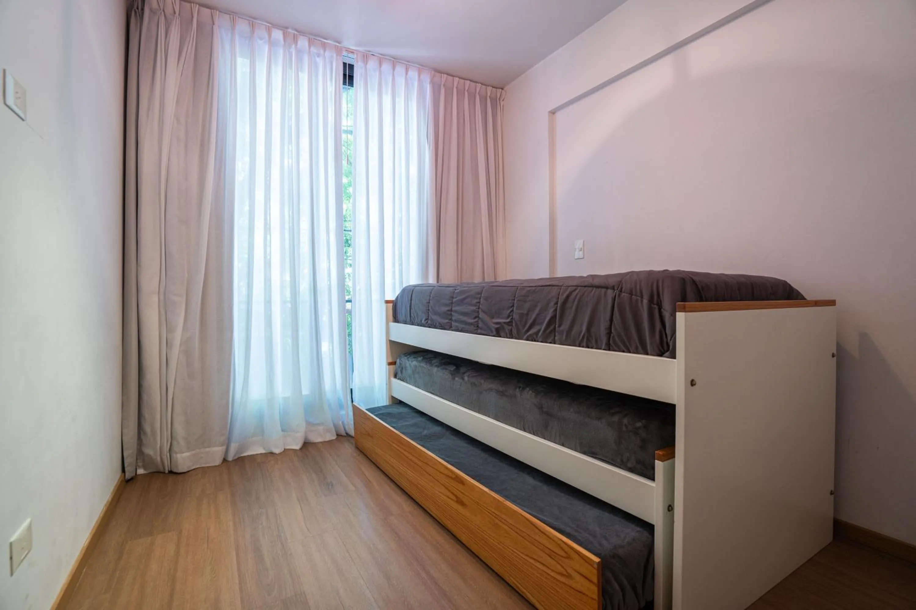 Bed in Monroe Suites