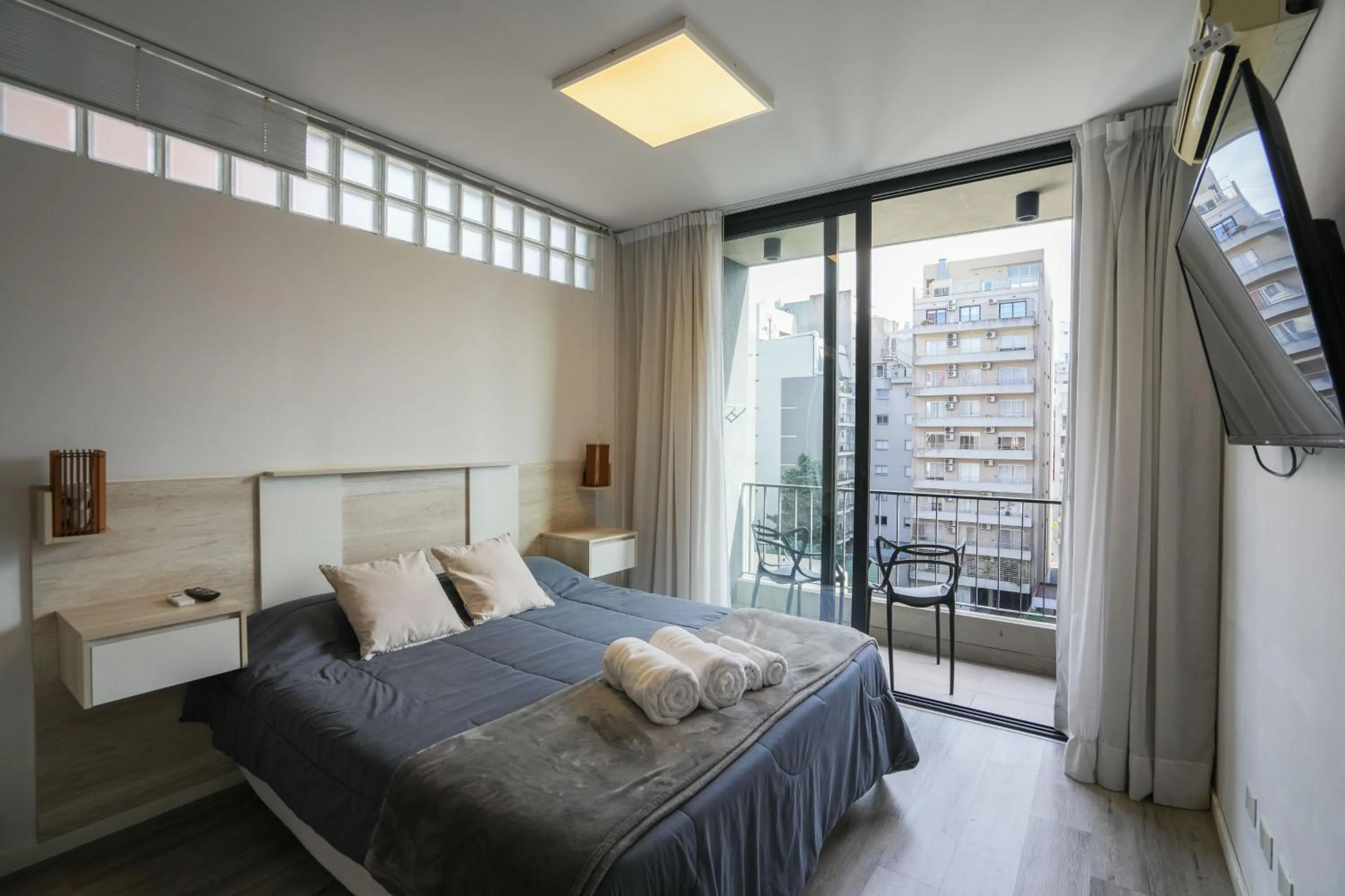 Bed in Monroe Suites