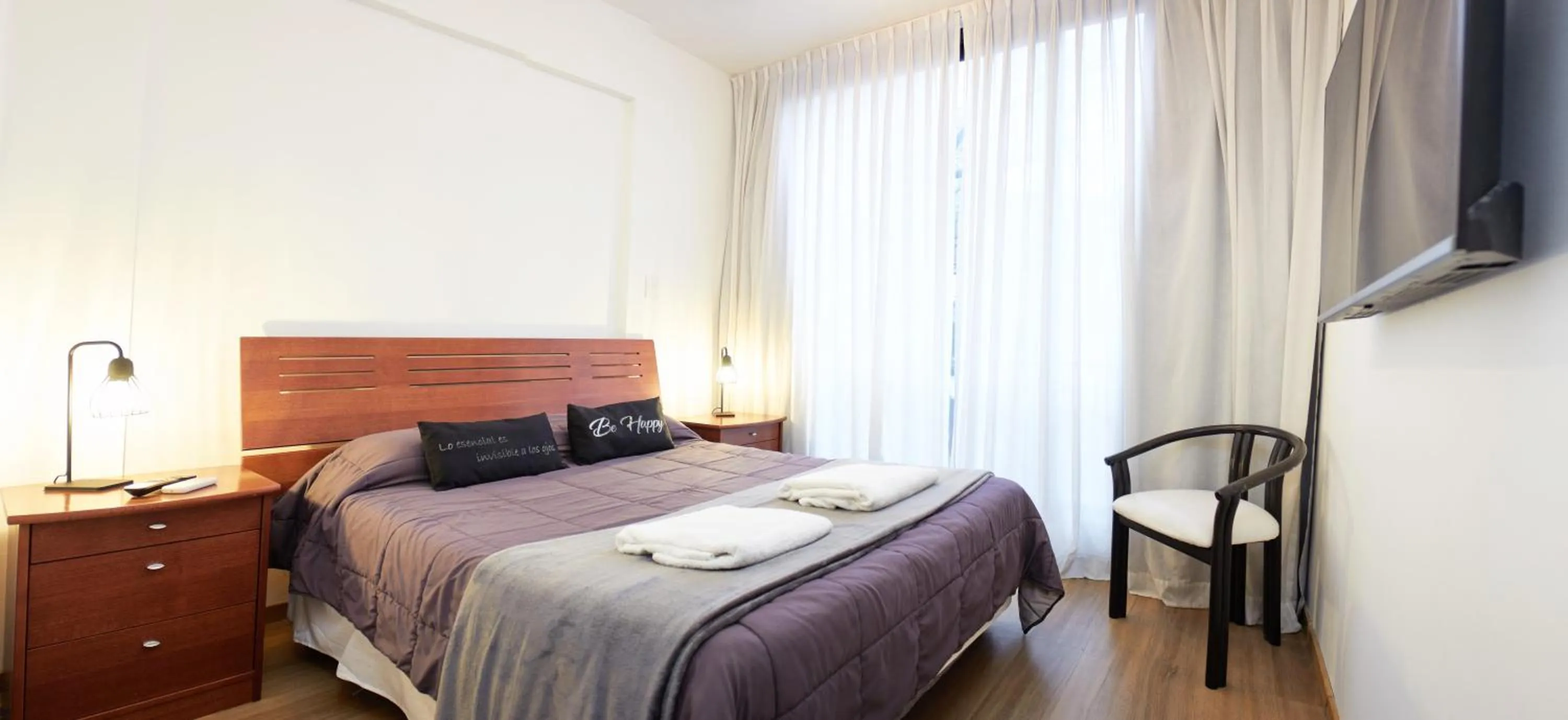 Bed in Monroe Suites