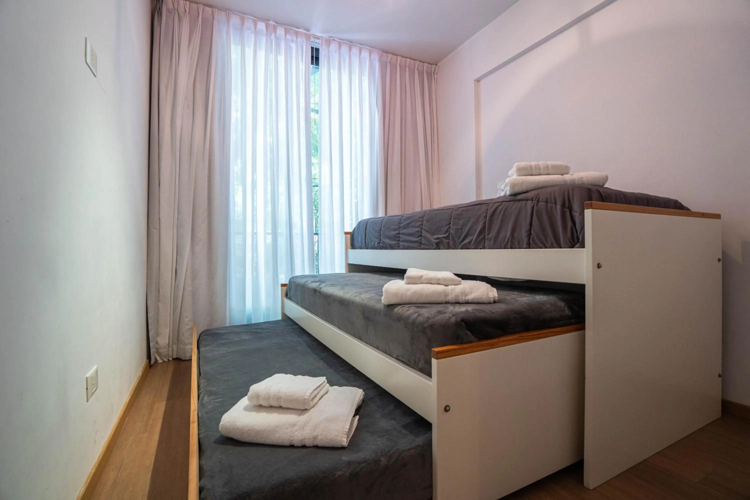 Bed in Monroe Suites