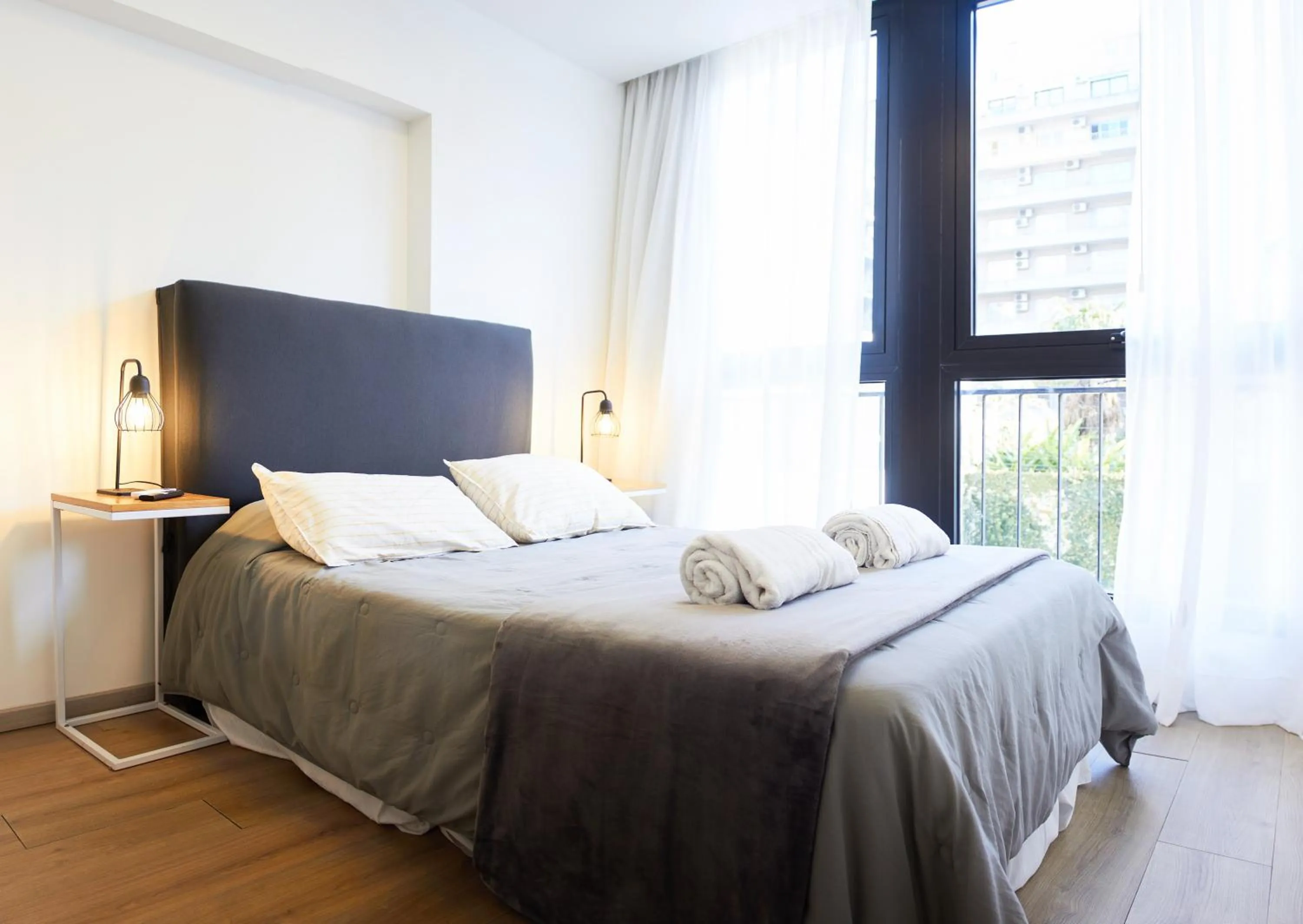 Bed in Monroe Suites