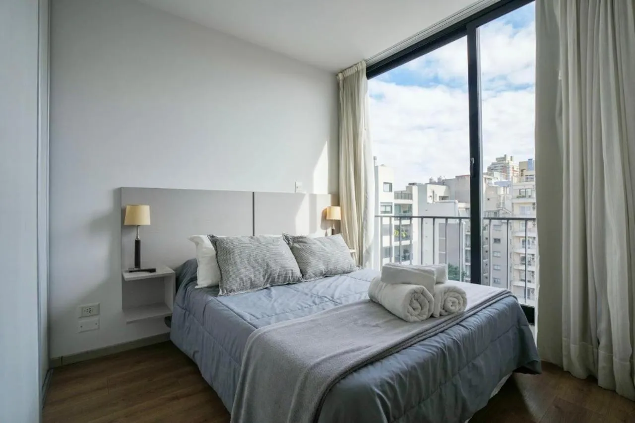 Bed in Monroe Suites