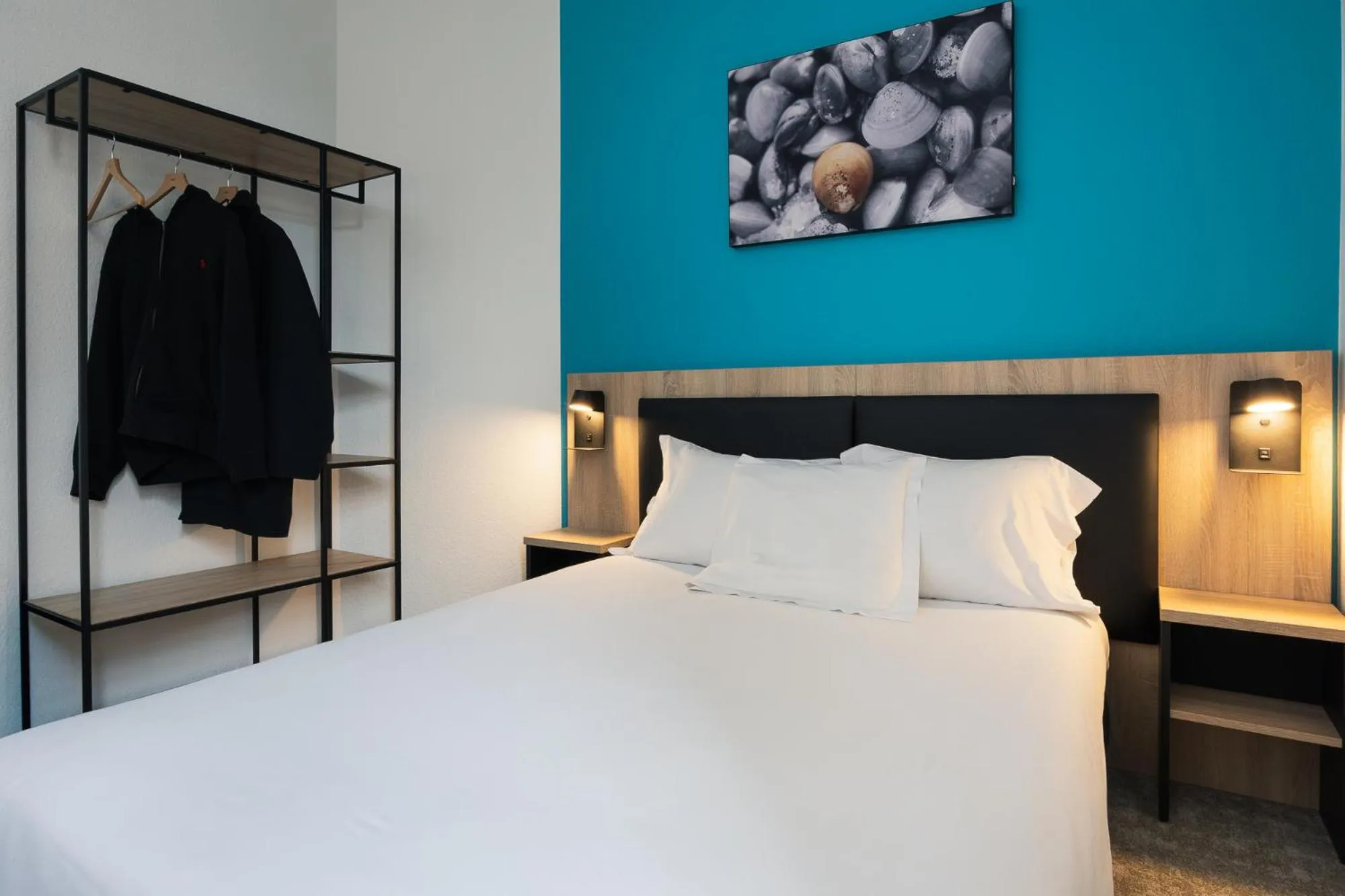 Bed in Hôtel de France - Le Patriarche