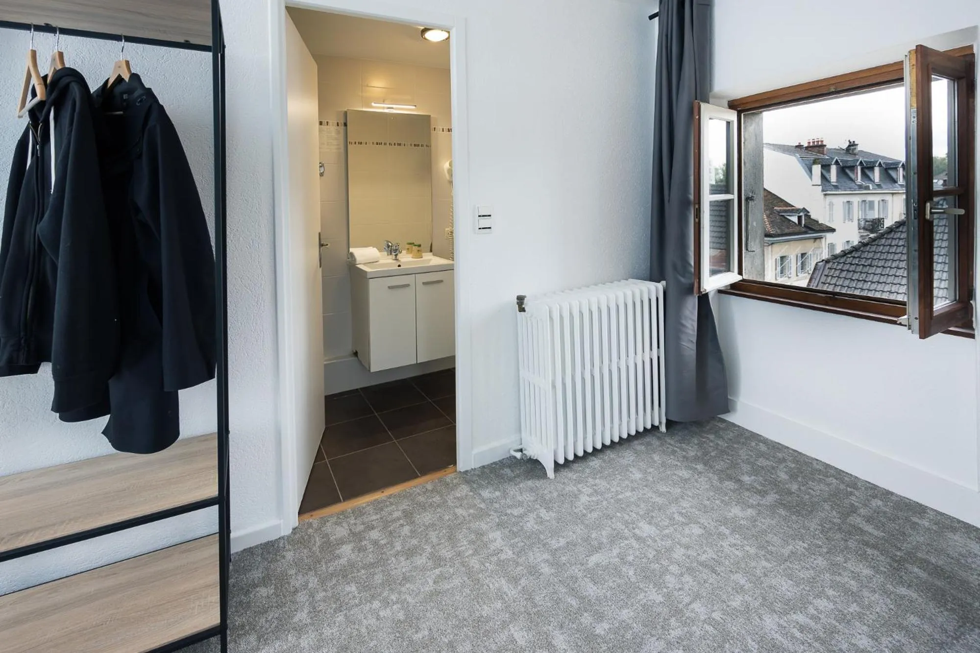 Property building in Hôtel de France - Le Patriarche