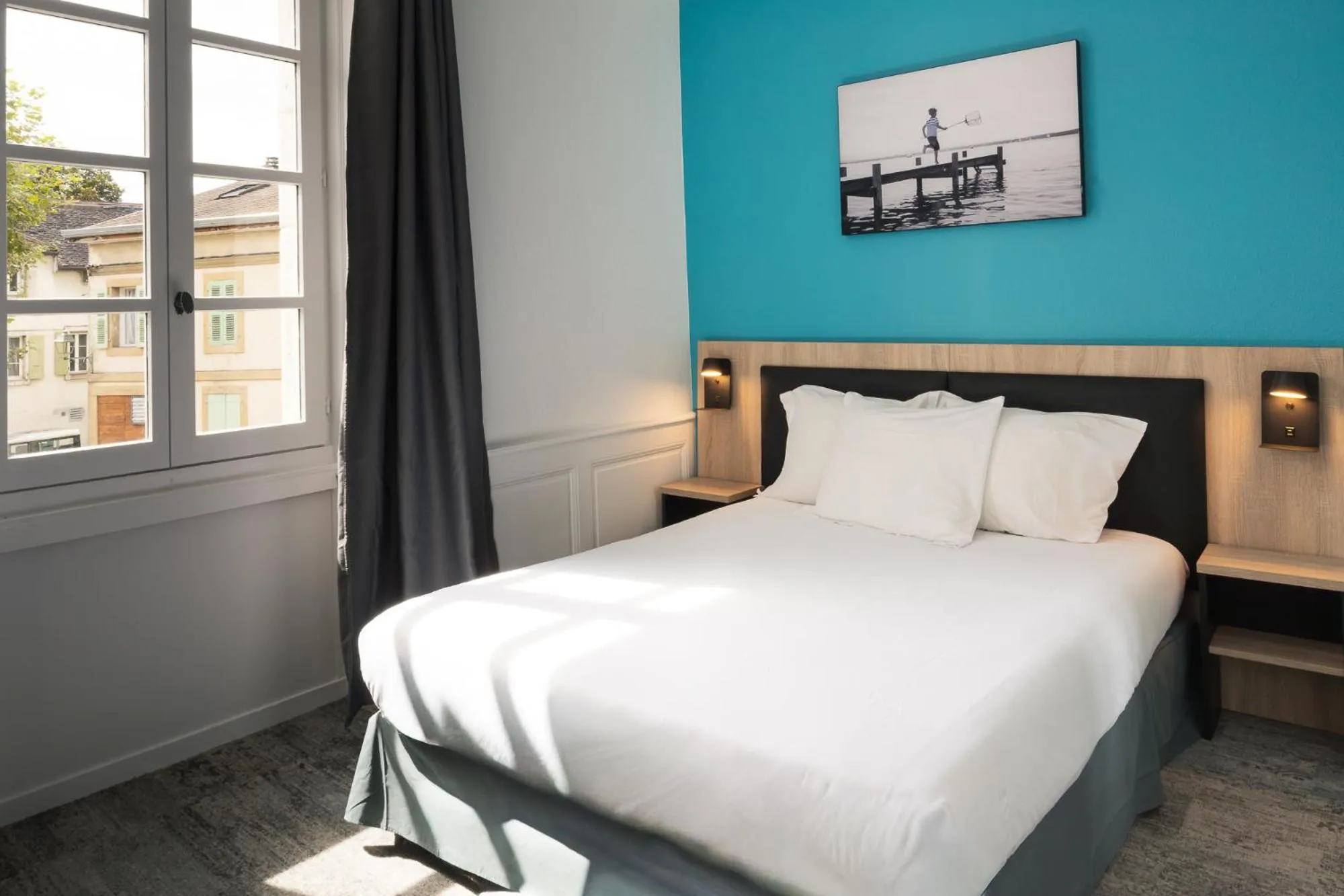 Bed in Hôtel de France - Le Patriarche