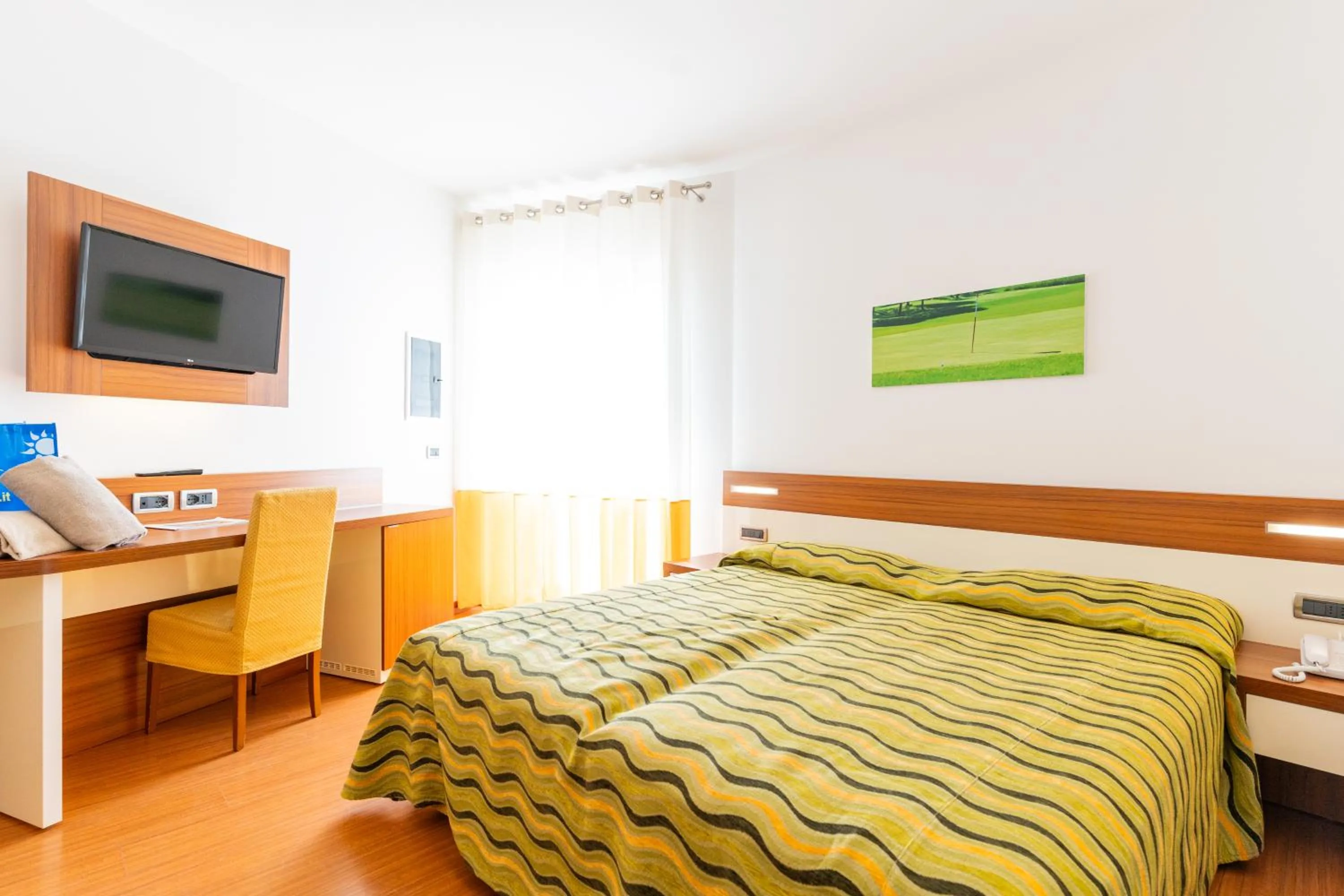 Bed in Hotel Maregolf