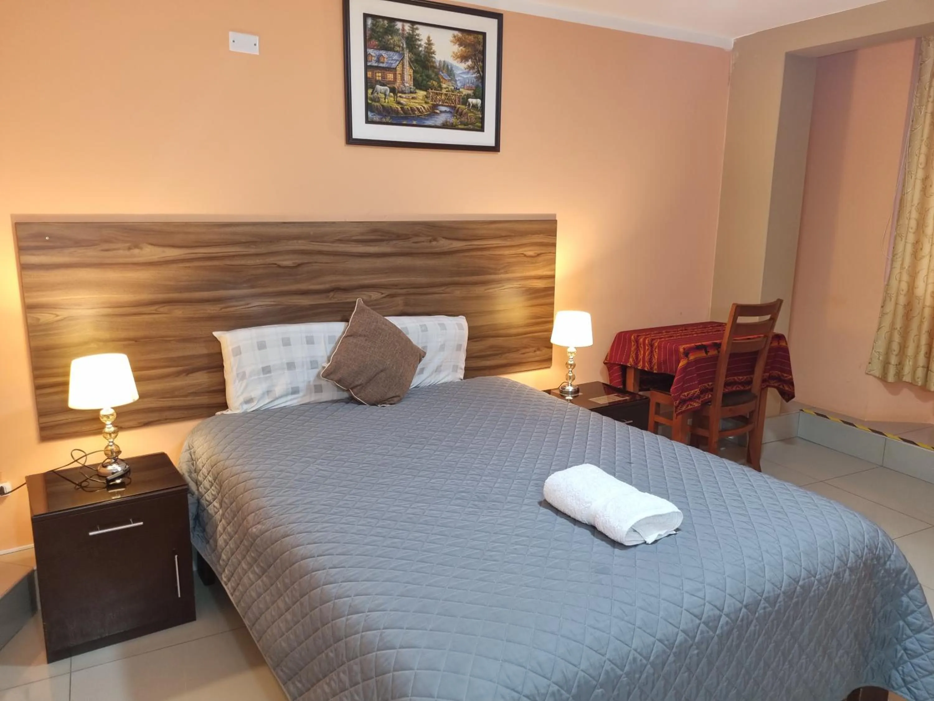 Bed in Hotel Los Nogales