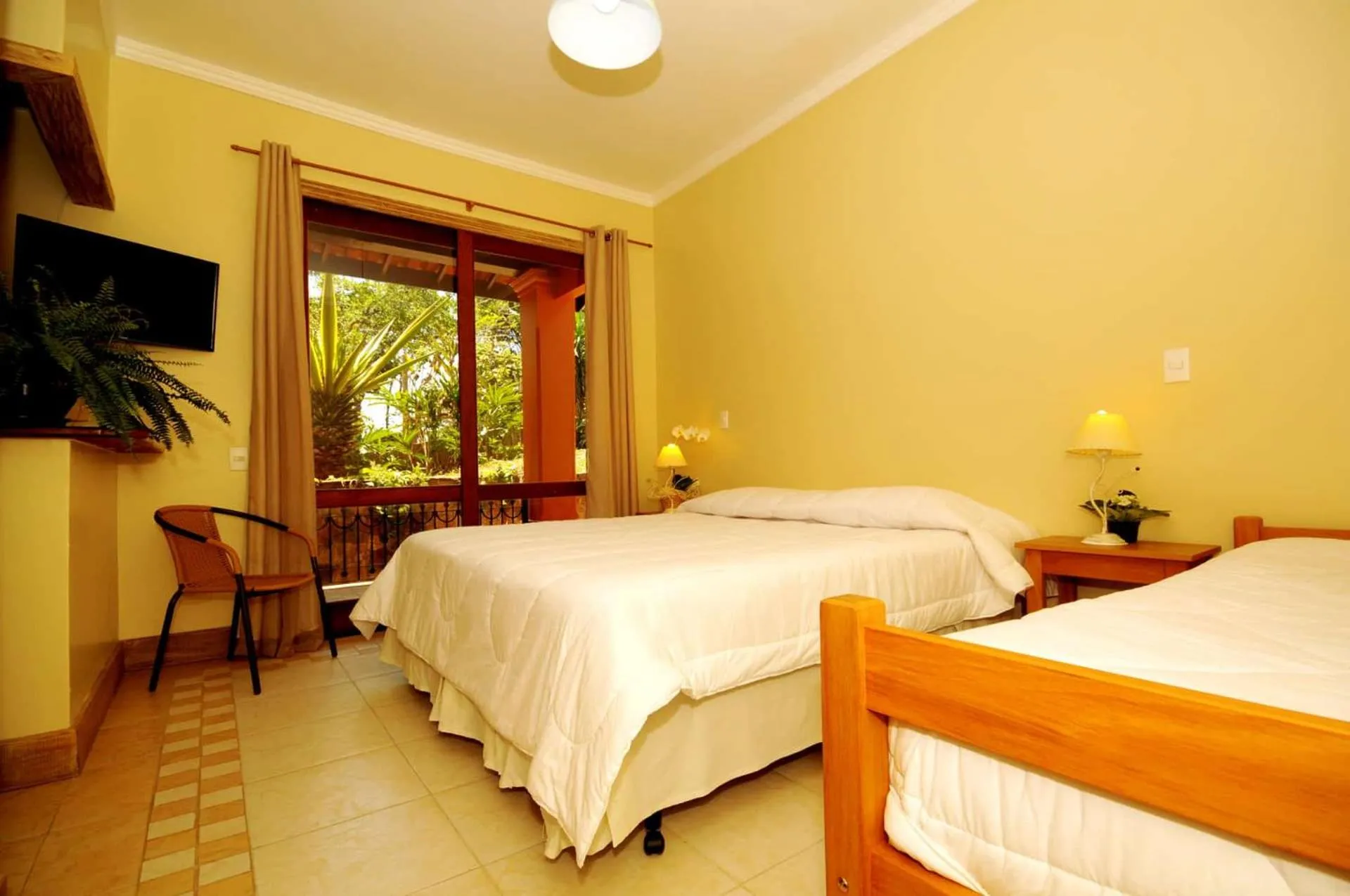 Bed in Pousada Pelicano