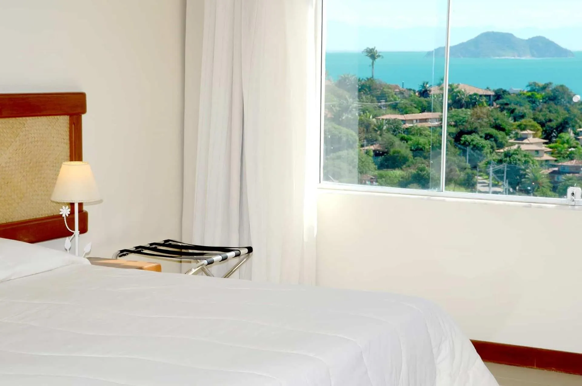 Bed in Pousada Pelicano