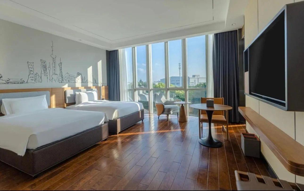 Bed in UrCove by Hyatt Shanghai Pudong East