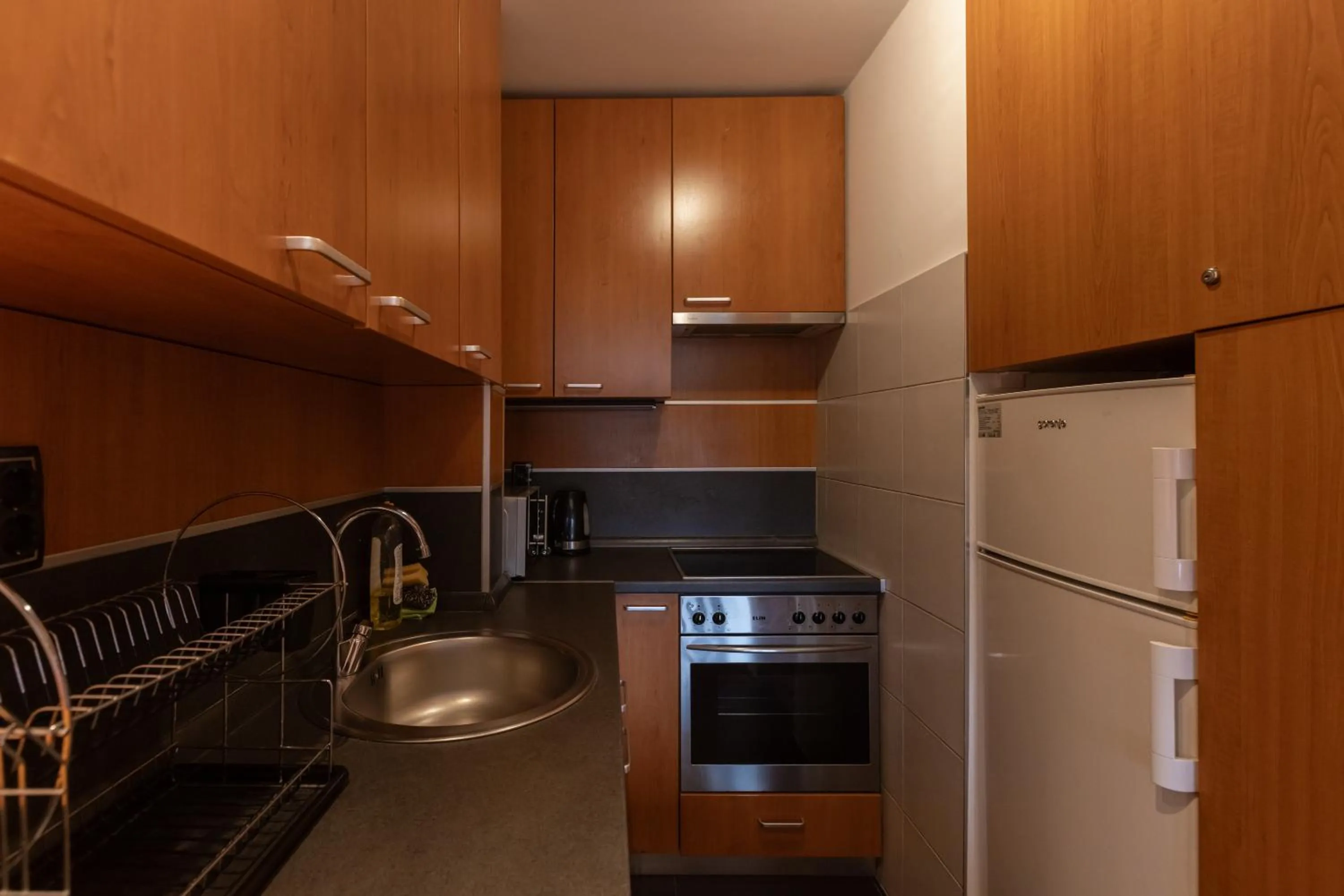 Kitchen or kitchenette in Central Park Apartments