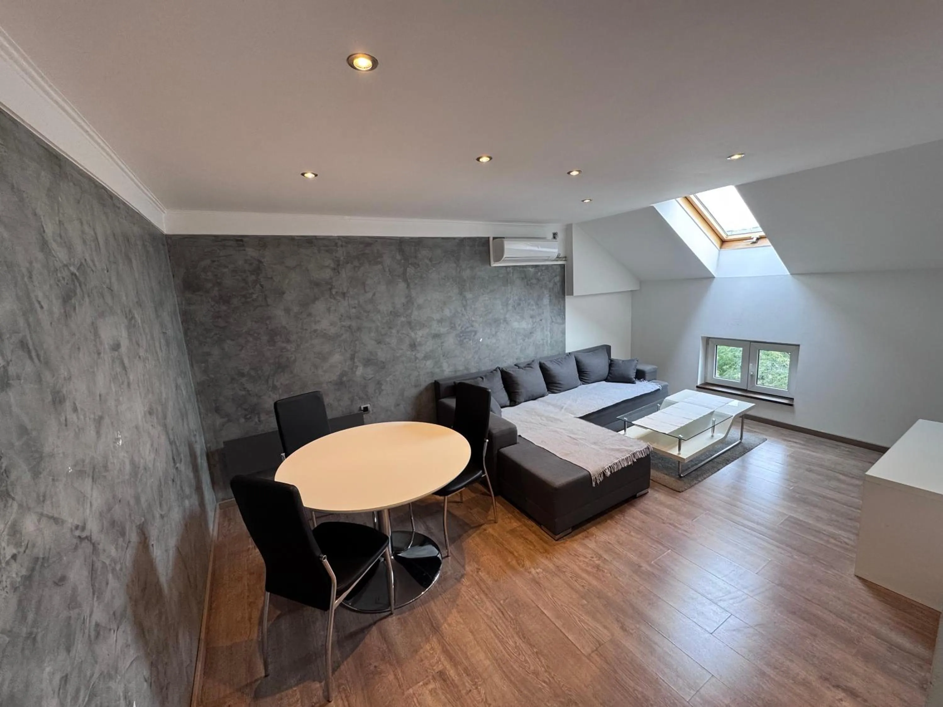 Living room in Central Park Apartments