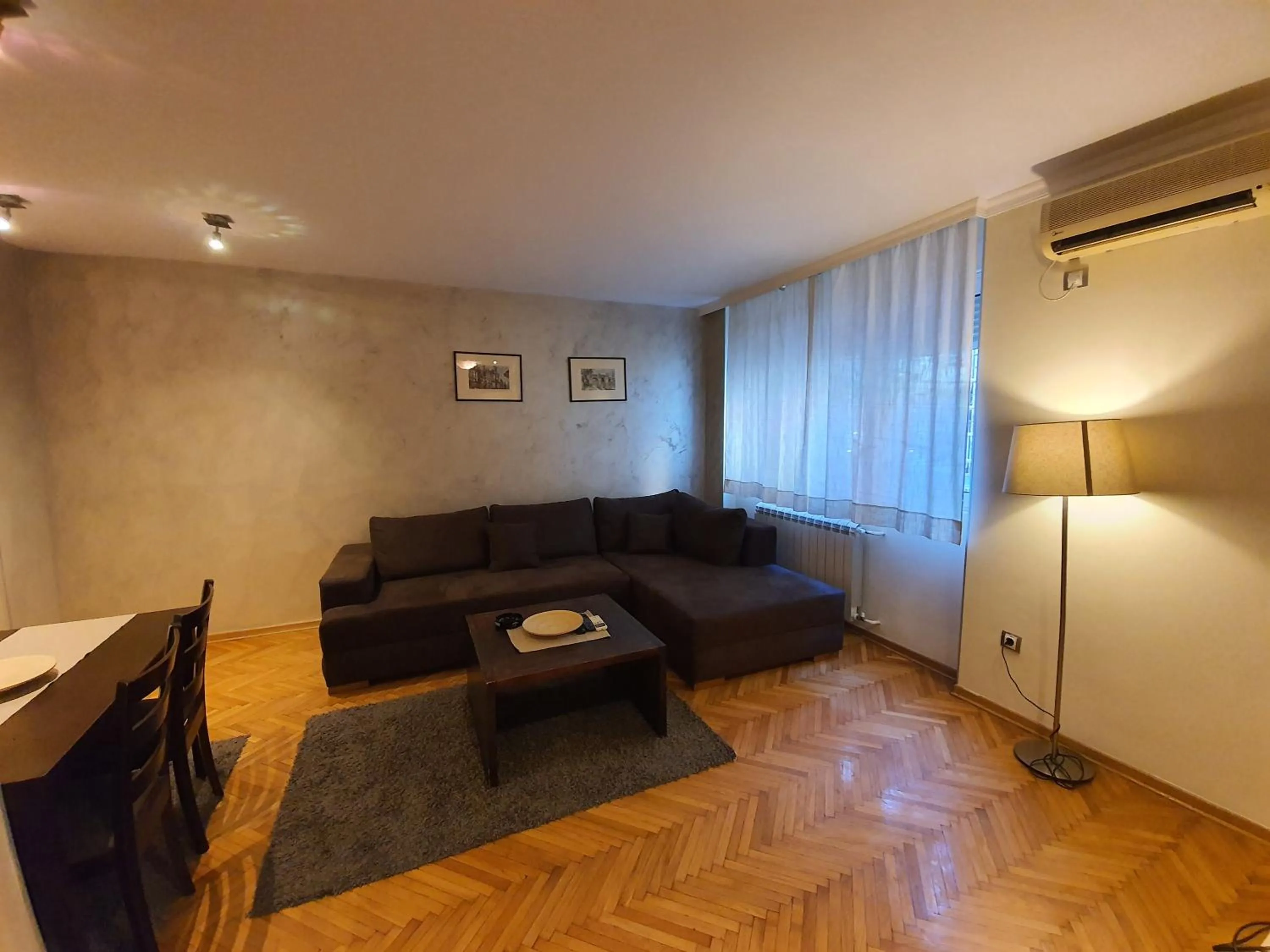 Living room in Central Park Apartments