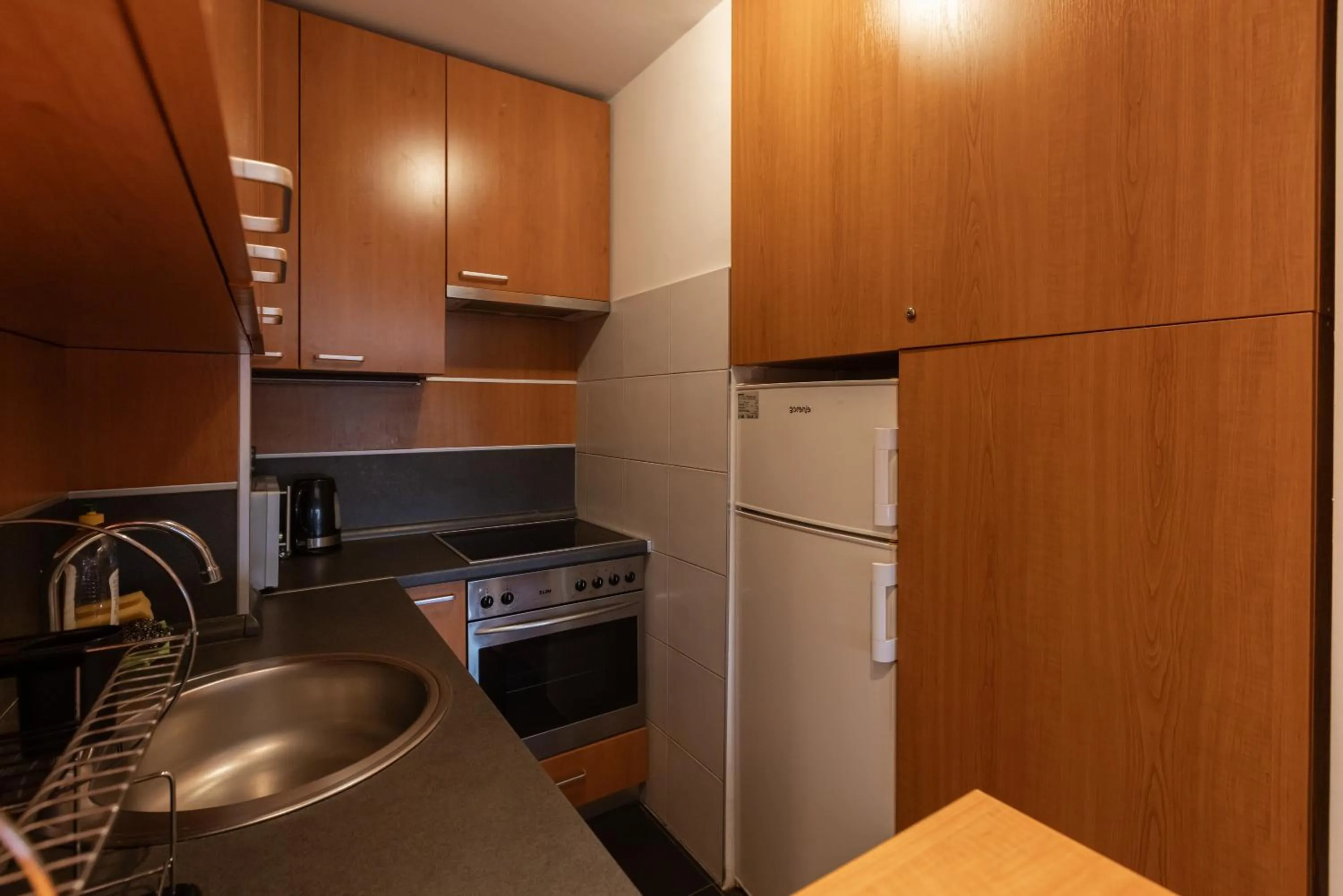 Kitchen or kitchenette in Central Park Apartments