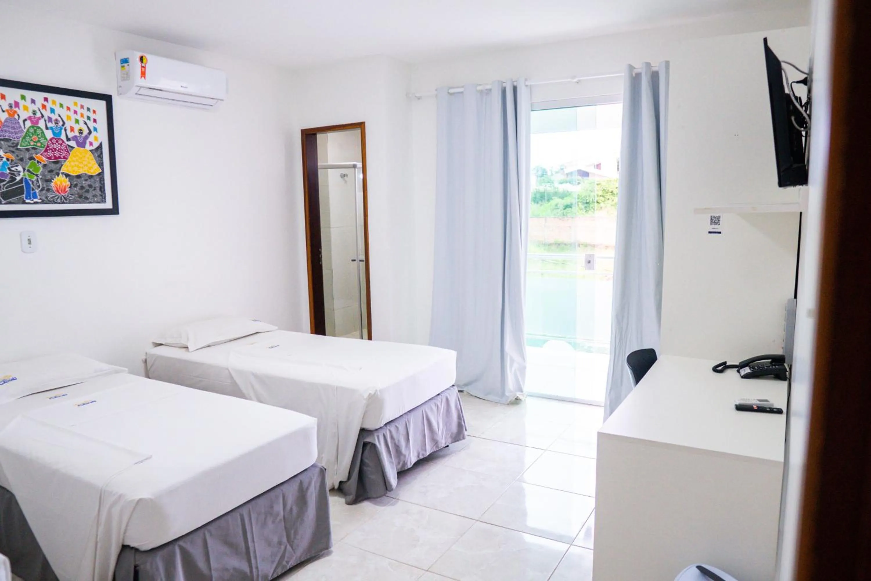 Bed in Belaris Hotel