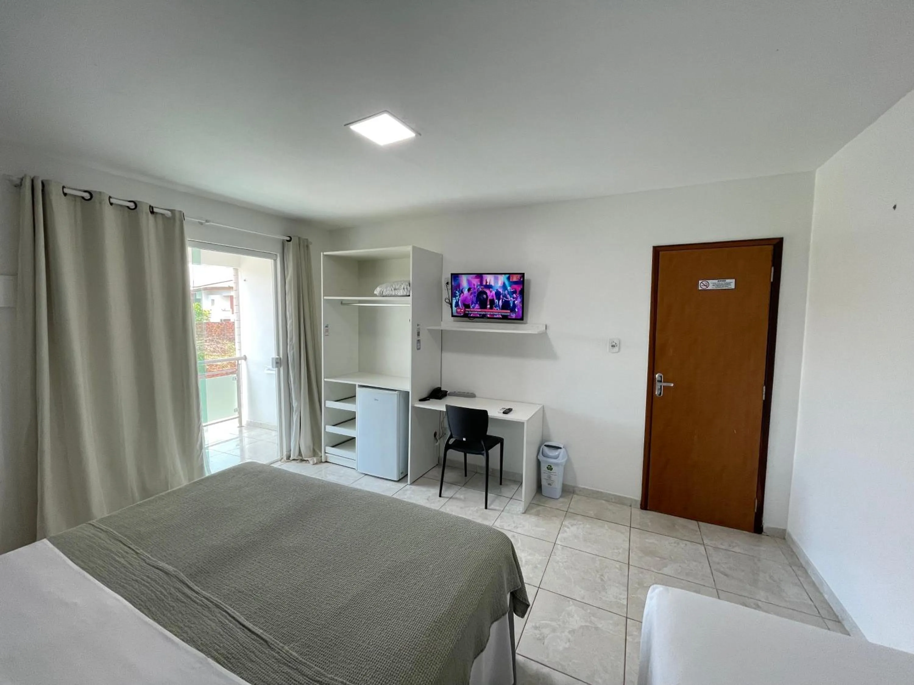 Bed in Belaris Hotel