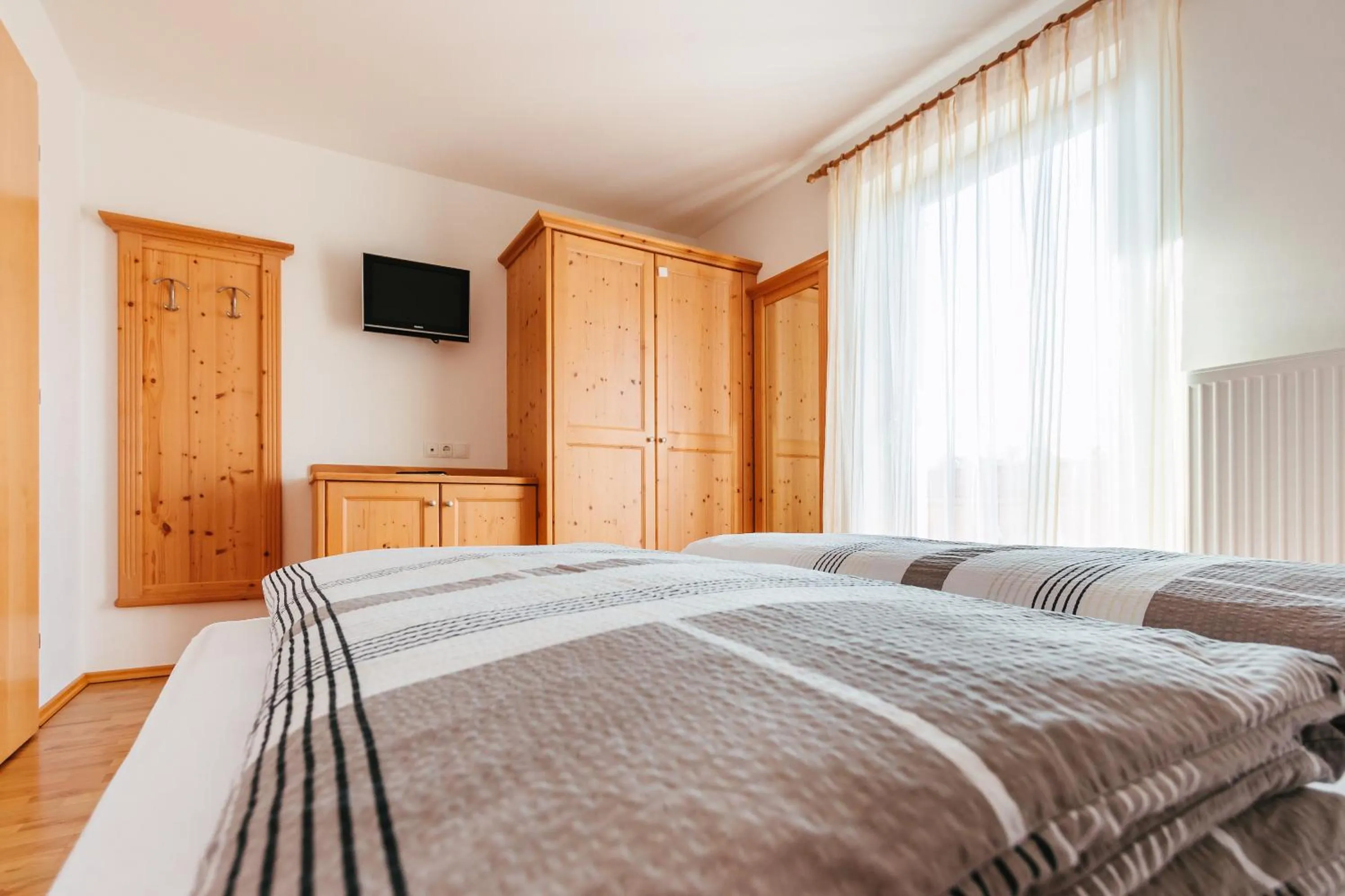 Photo of the whole room, Bed in Residence Speckerhof