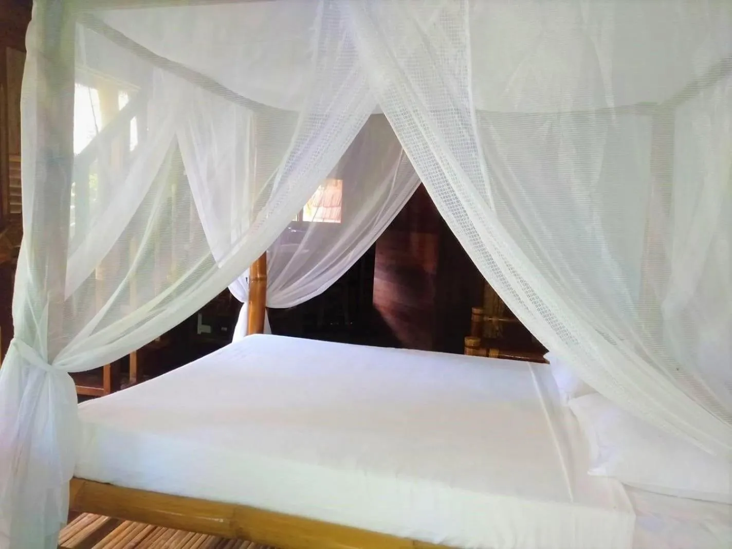 Bed in VILLA MARMARINE BEACH RESORT & RESTAURANT