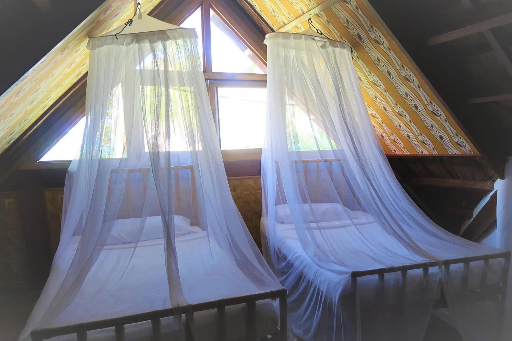 Bed in VILLA MARMARINE BEACH RESORT & RESTAURANT