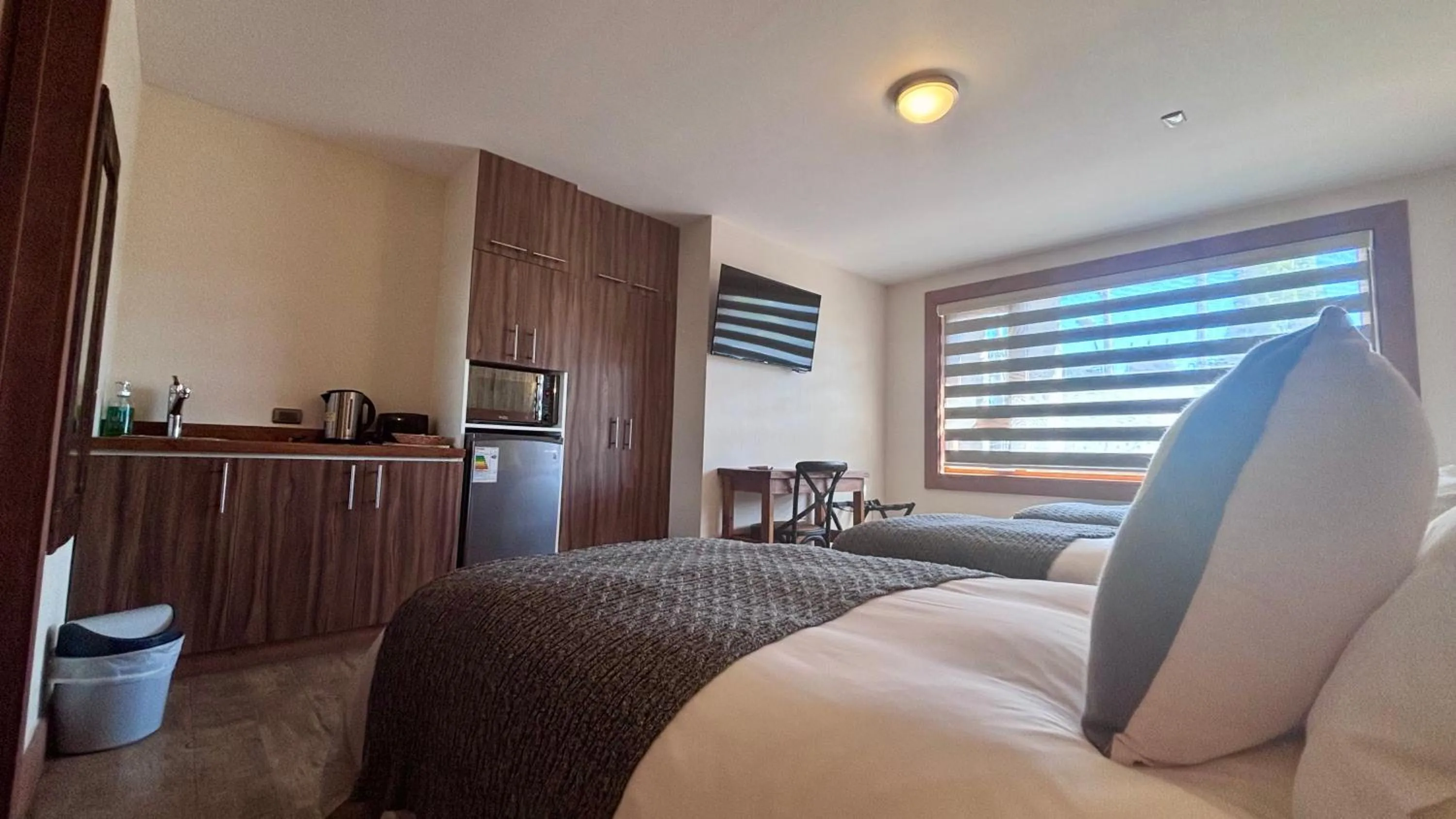 Bed in Entre Cumbres Apart Hotel