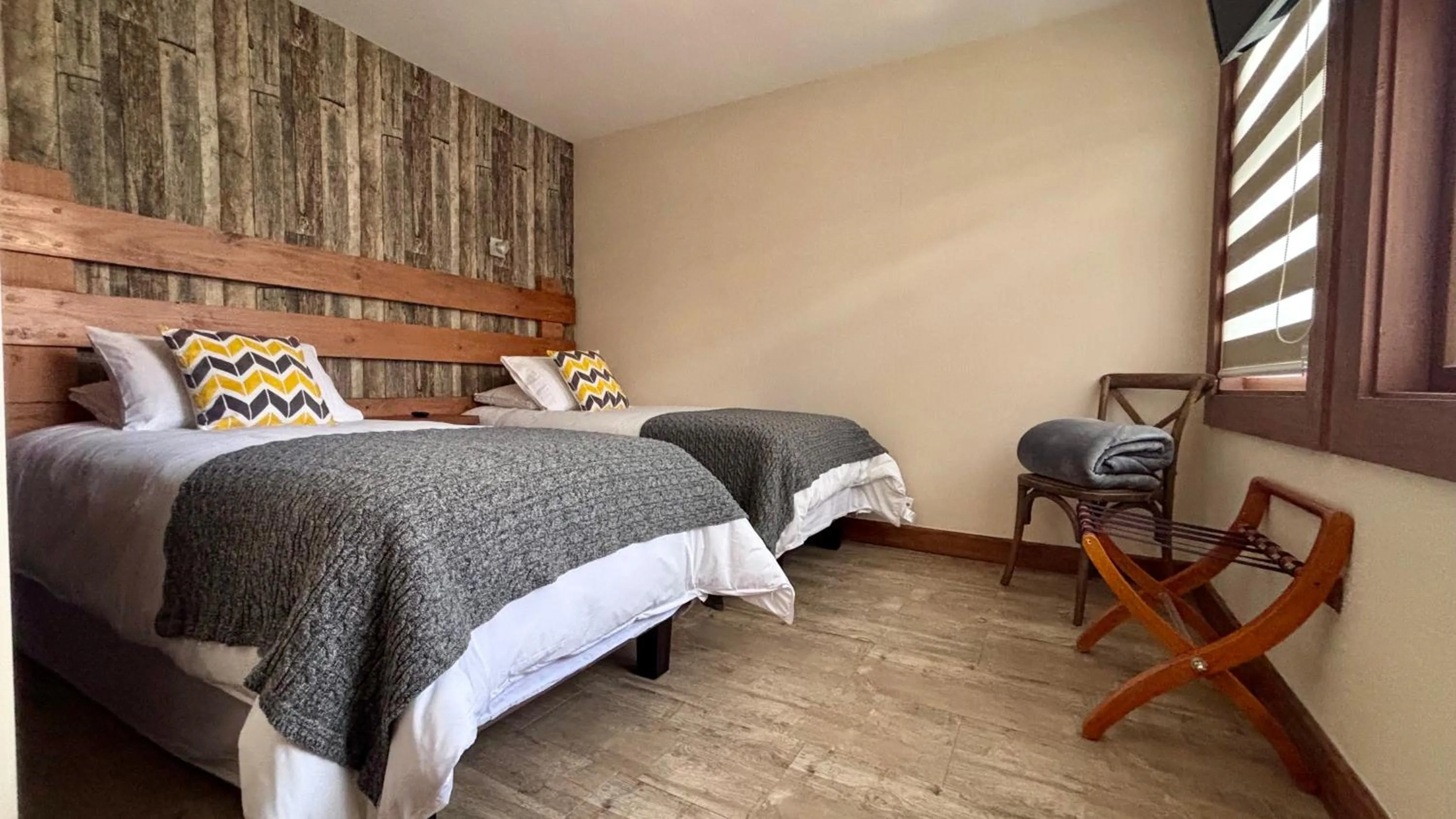 Bed in Entre Cumbres Apart Hotel