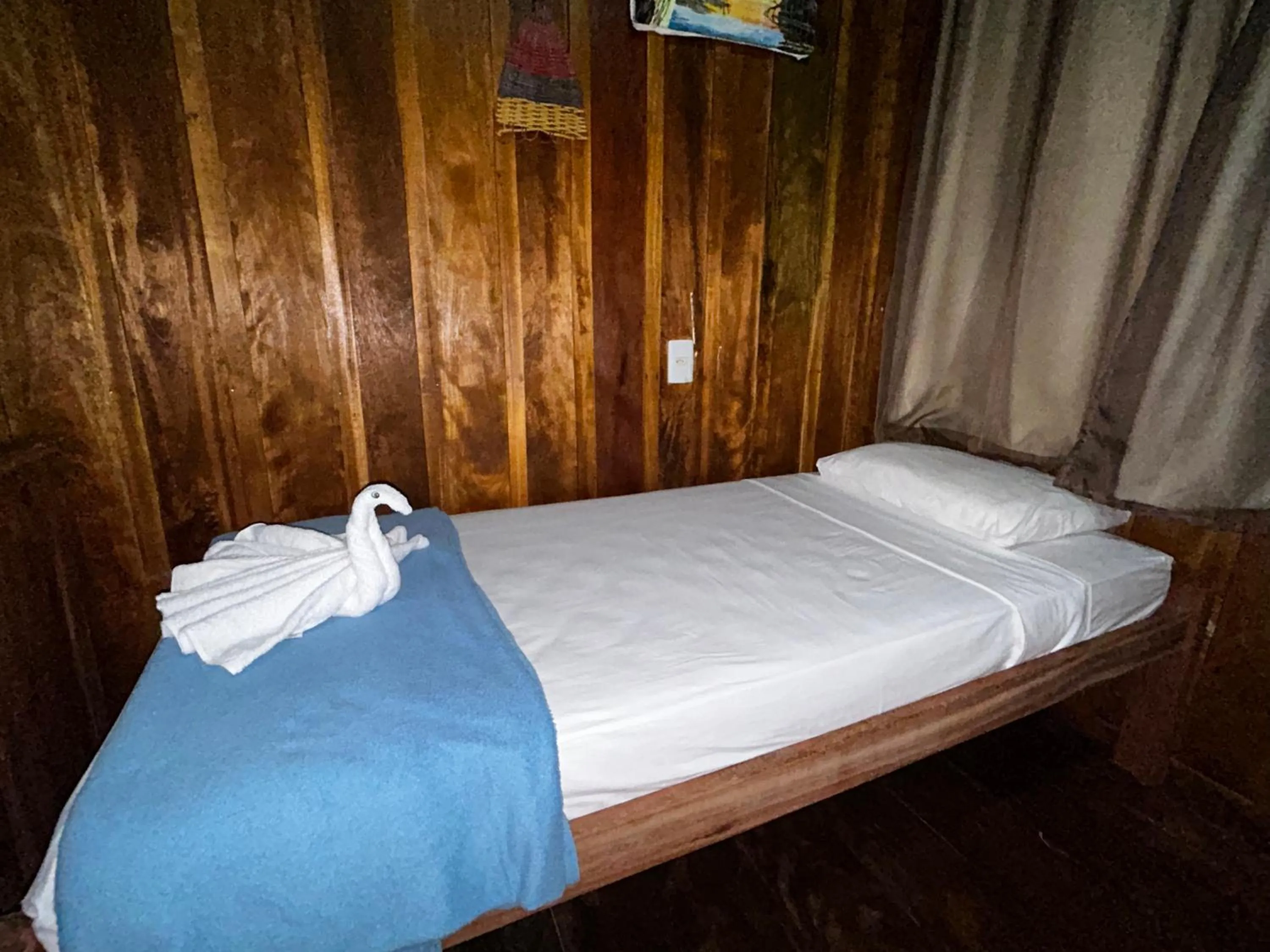 Bed in Vista do Lago Jungle Lodge