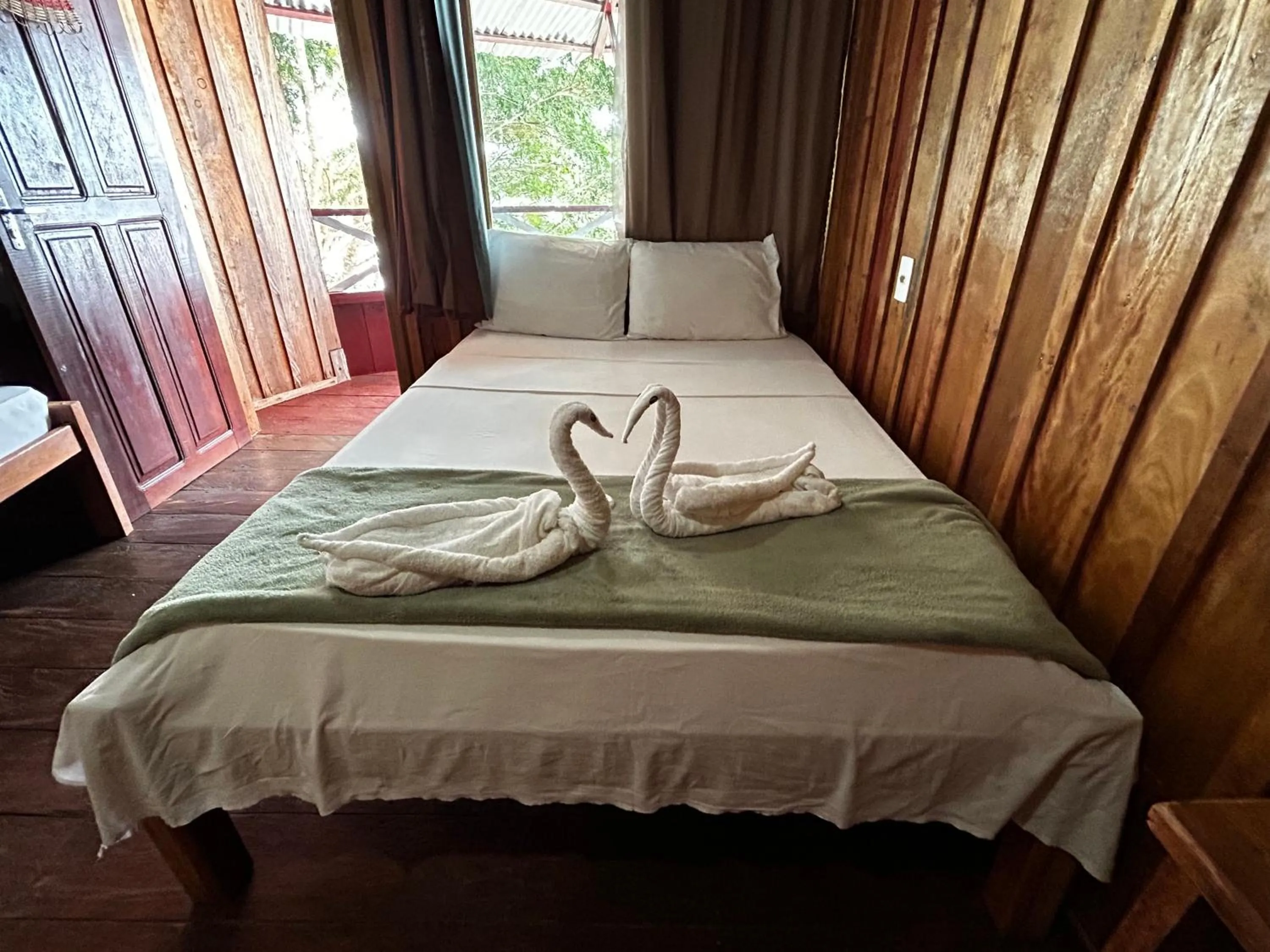 Bed in Vista do Lago Jungle Lodge