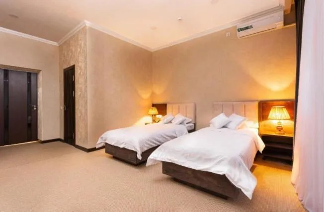 Bed in Grand Fergana Hotel