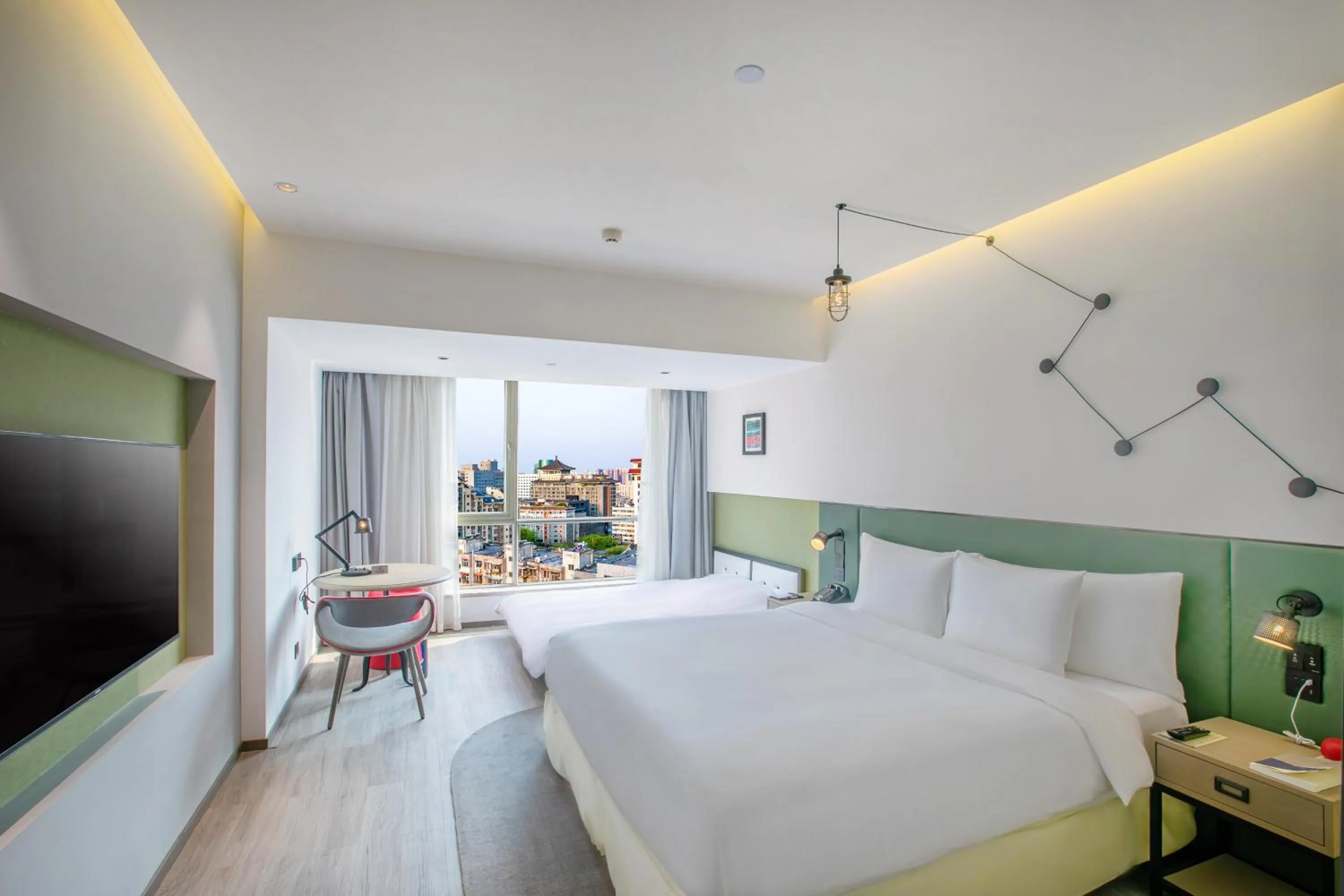 Bed in Jinmao Hotel Xi'an Downtown ( Bell & Drum Tower)