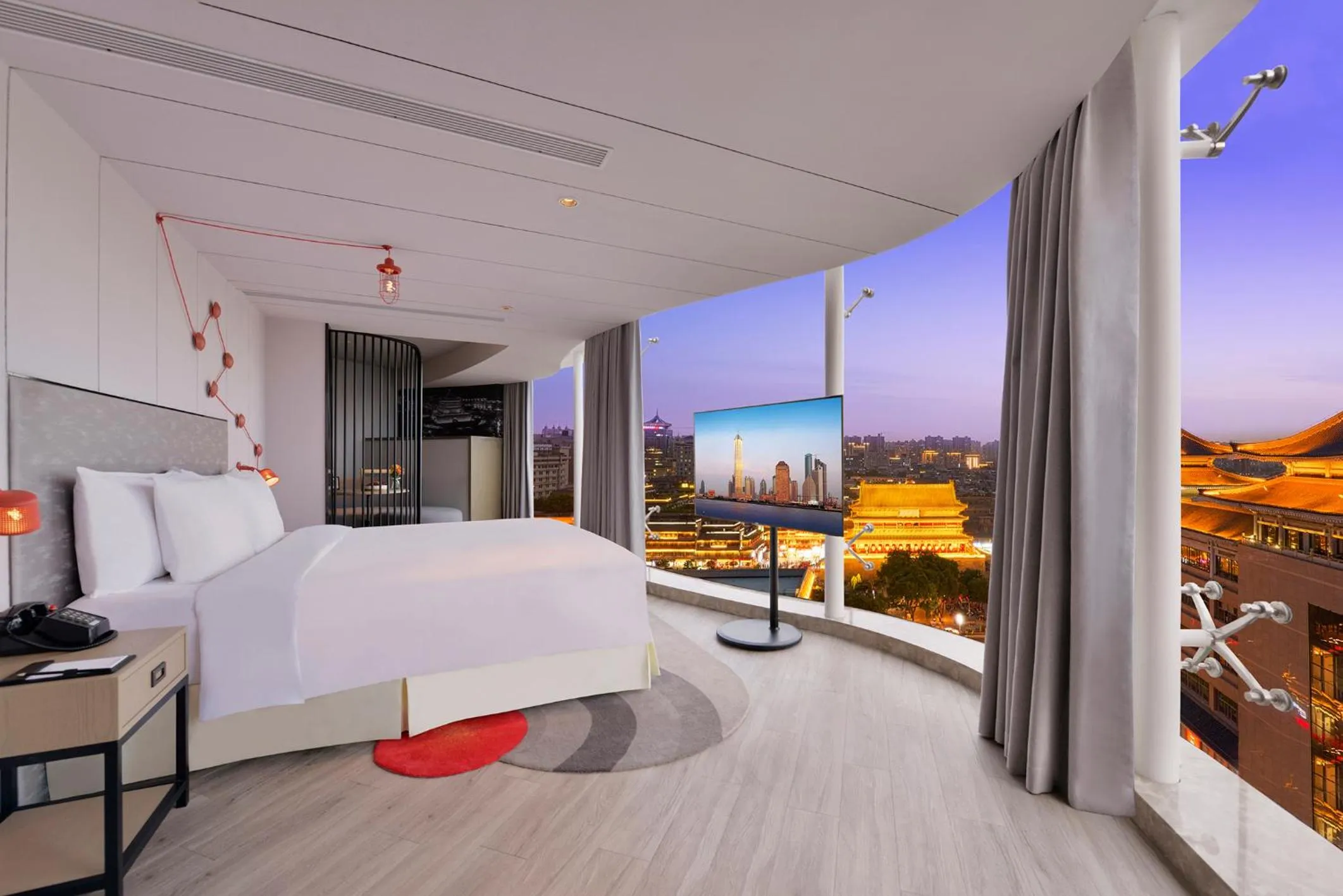 Bed in Jinmao Hotel Xi'an Downtown ( Bell & Drum Tower)