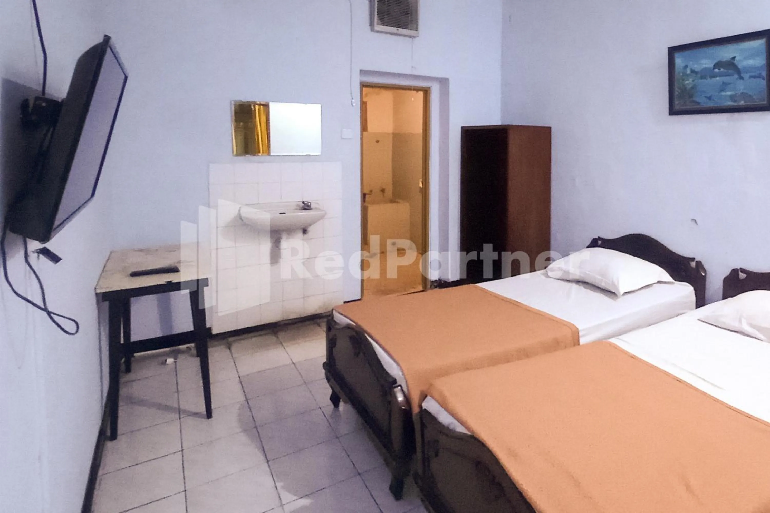 Bed in Hotel Palem 1 Syariah RedPartner