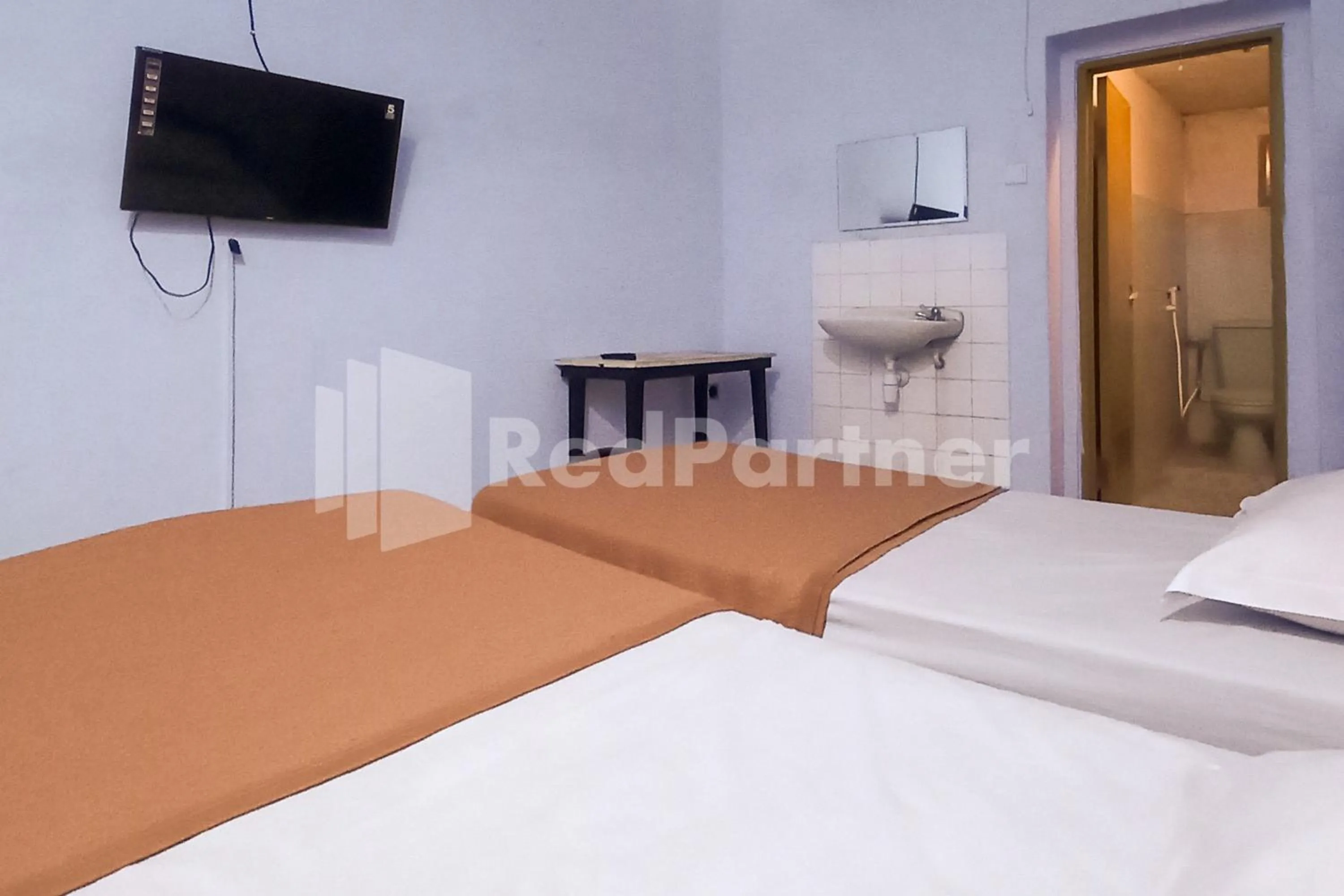 Bed in Hotel Palem 1 Syariah RedPartner