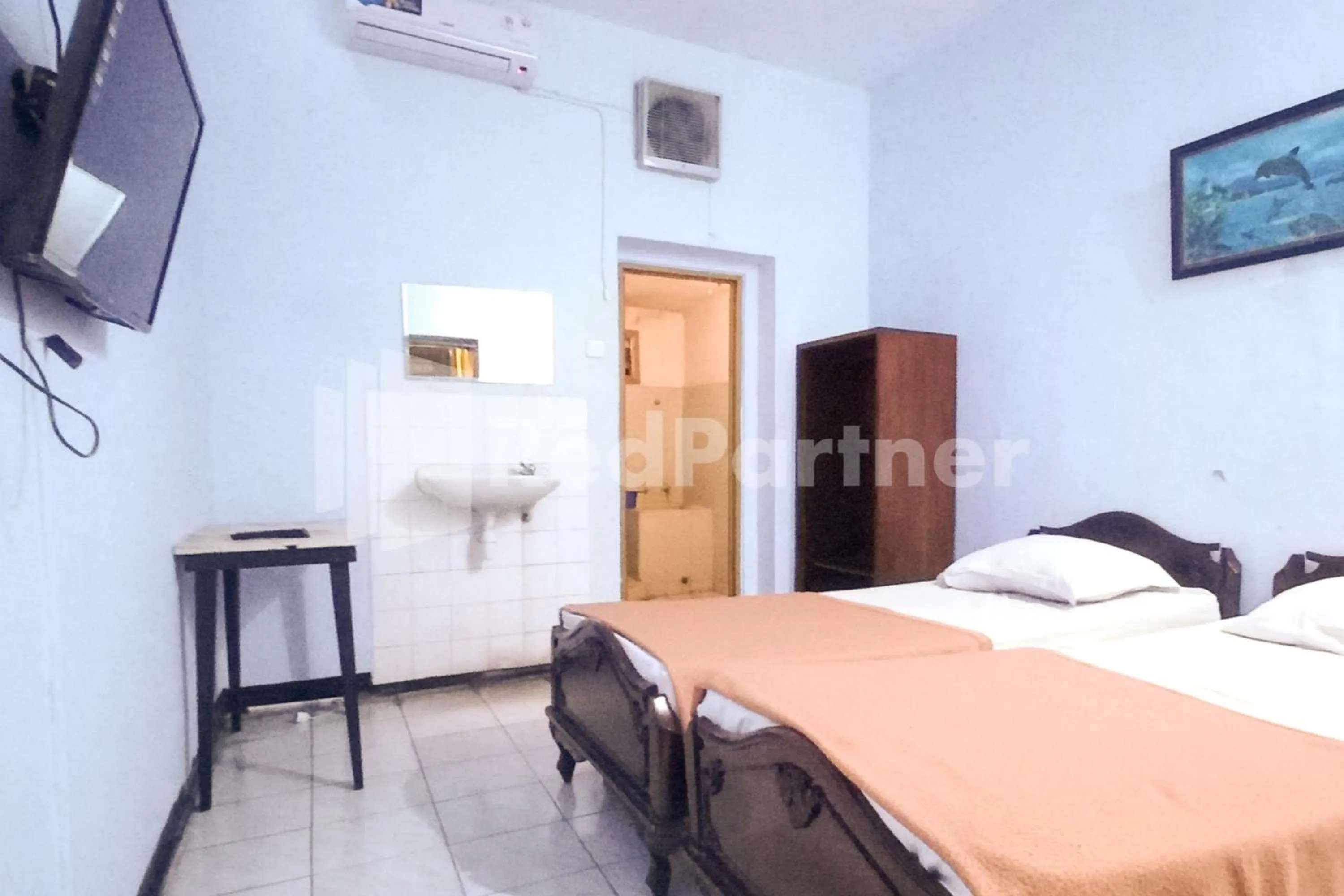 Bed in Hotel Palem 1 Syariah RedPartner