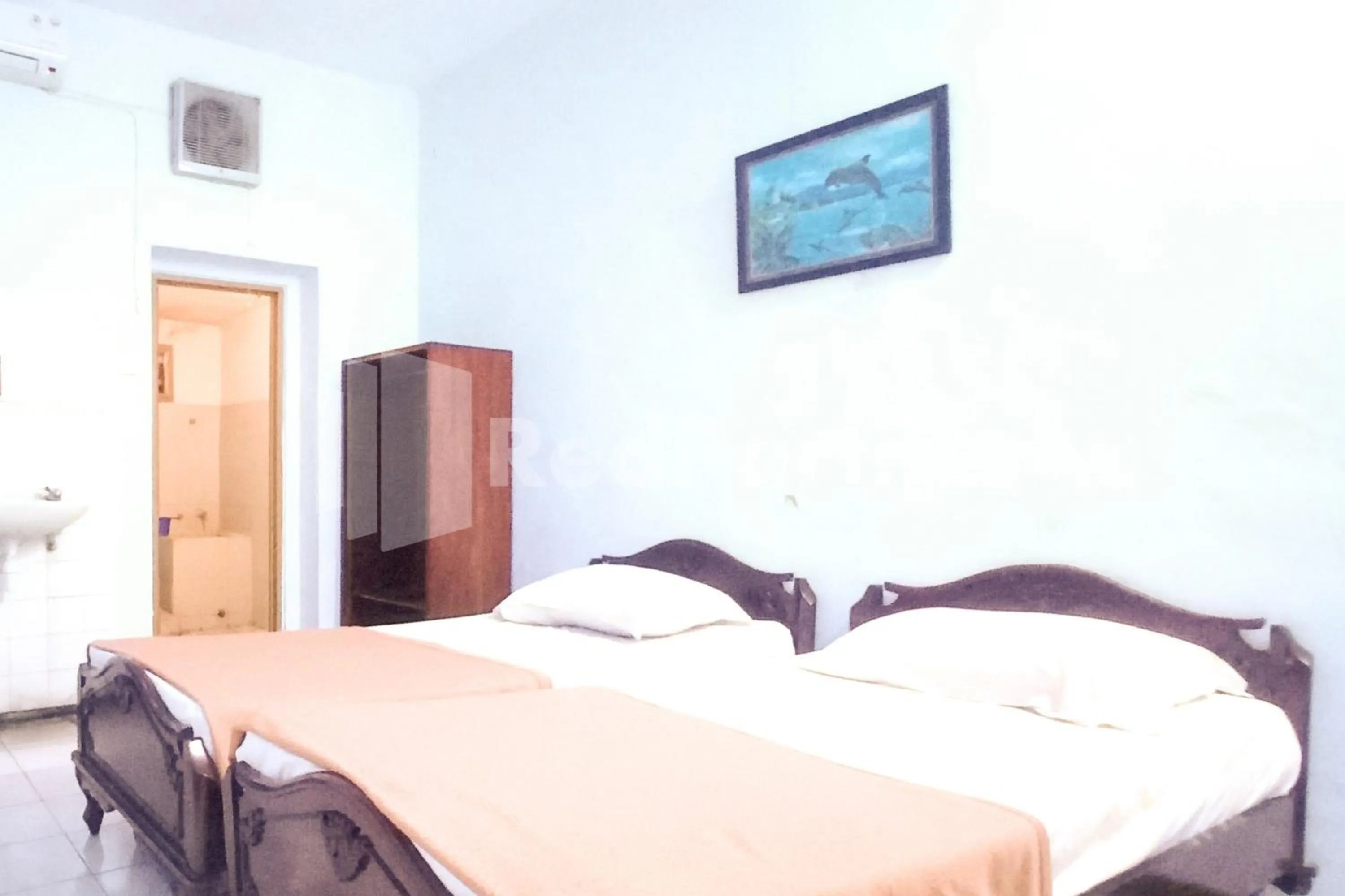 Bed in Hotel Palem 1 Syariah RedPartner