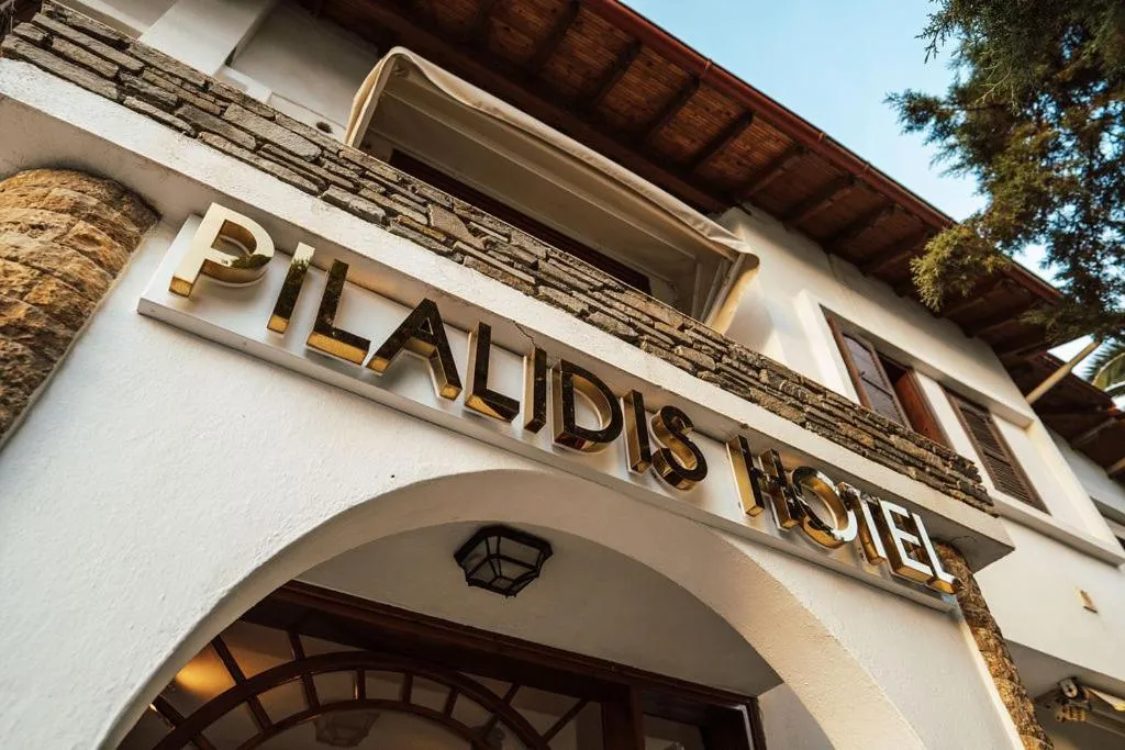 Property logo or sign in Hotel Pilalidis