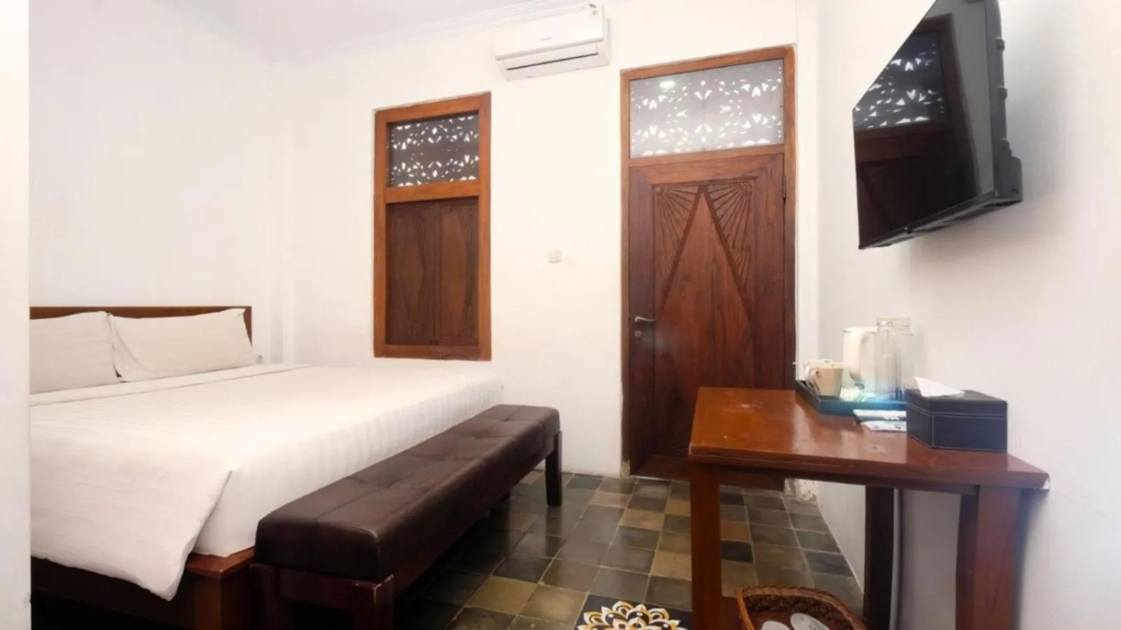 TV and multimedia, Bed in The Mangkoro Hotel by Sinergi