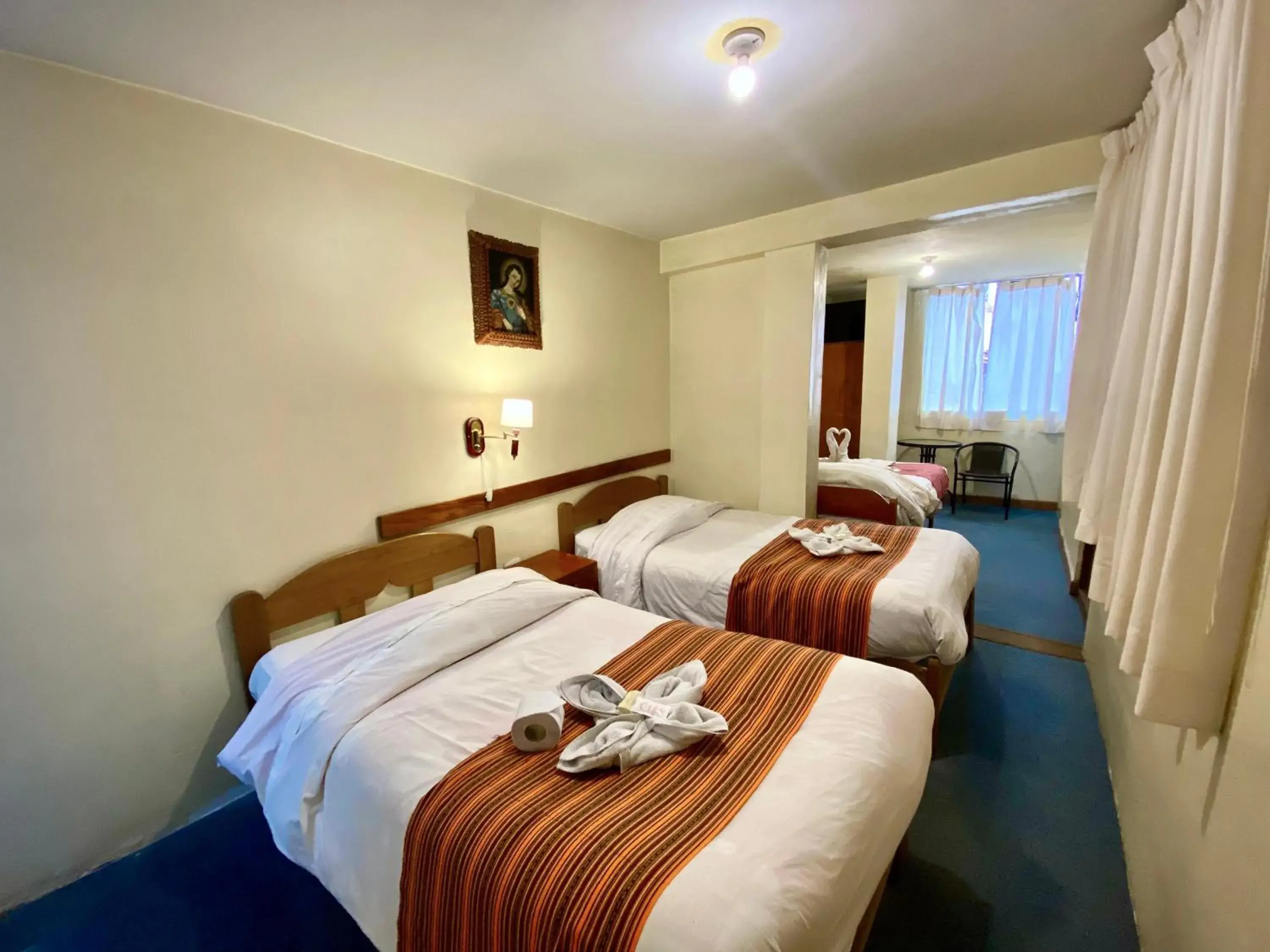Triple Room in Andean Dreams Hotel Triple Room in Andean Dreams Hotel