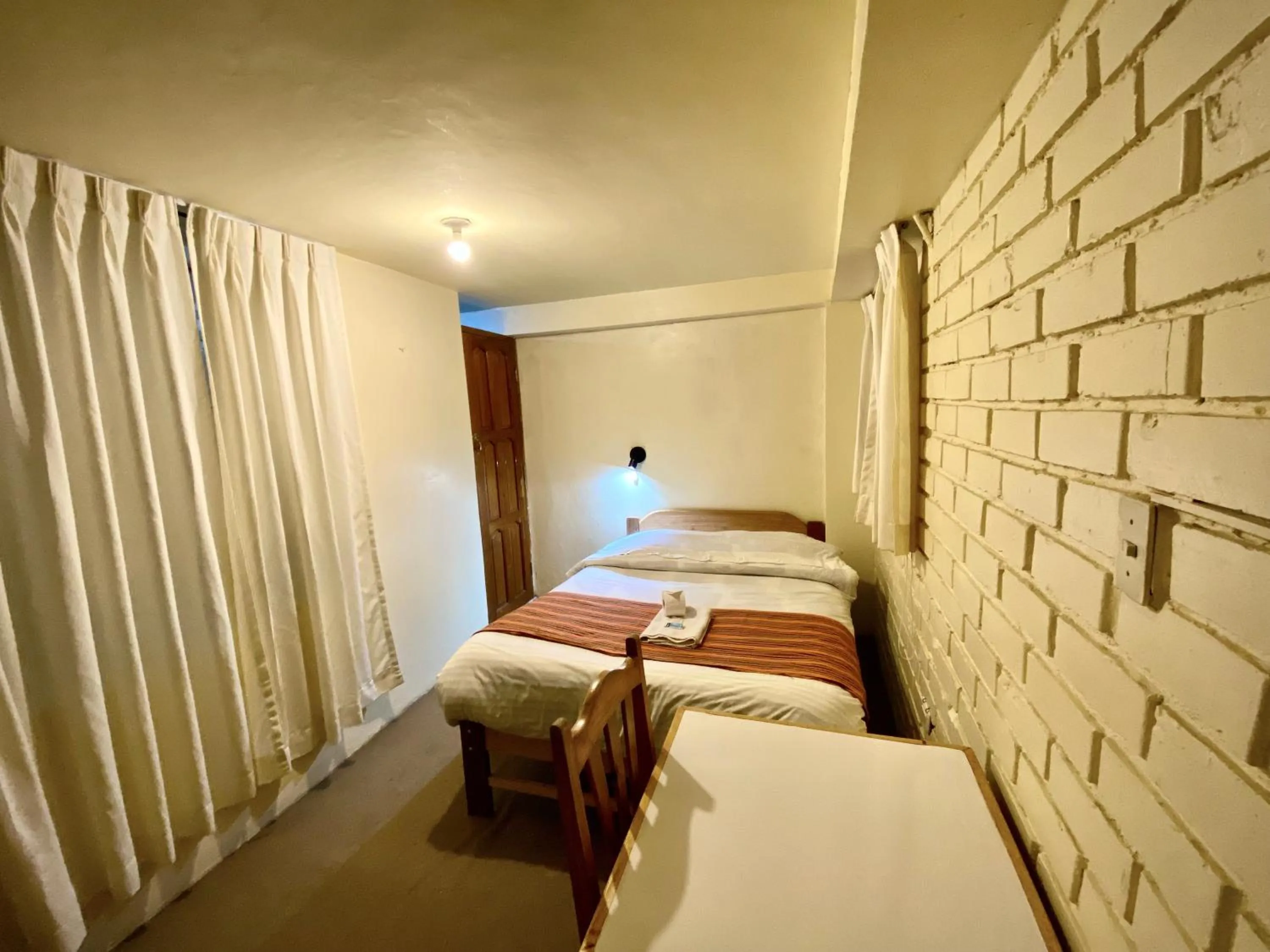 Bed in Andean Dreams Hotel