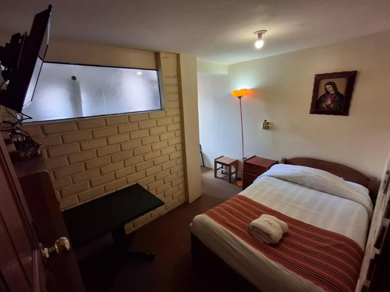 Bed in Andean Dreams Hotel